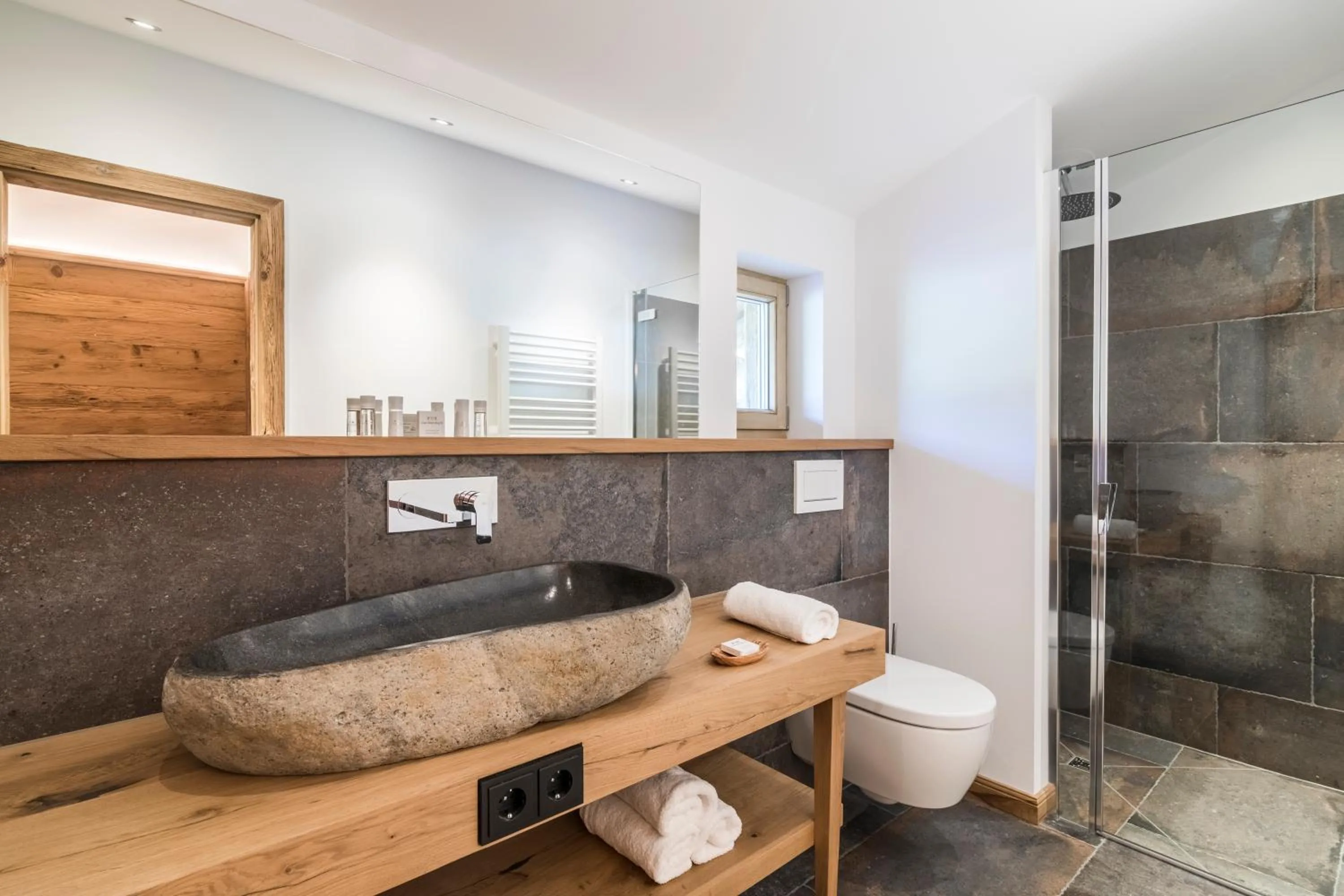 Shower in Relais & Châteaux Gut Steinbach Hotel Chalets SPA