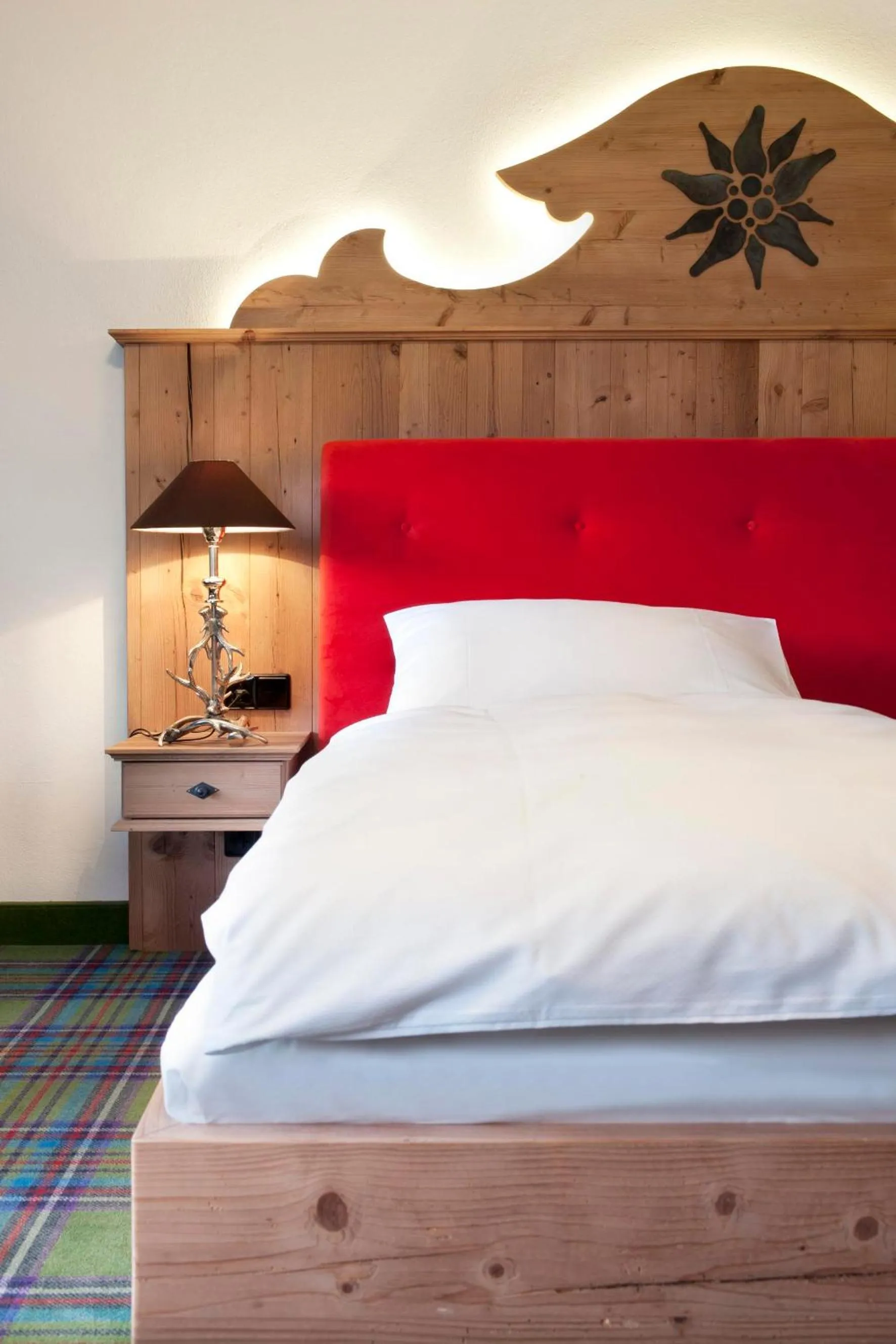 Bed in Relais & Châteaux Gut Steinbach Hotel Chalets SPA