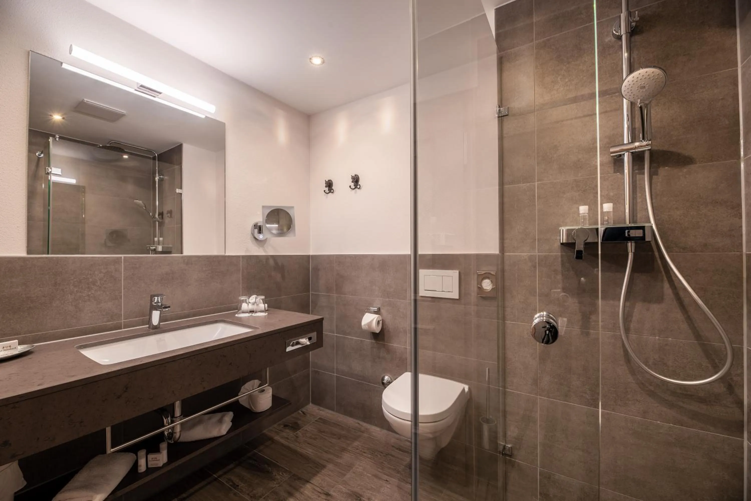 Shower in Relais & Châteaux Gut Steinbach Hotel Chalets SPA