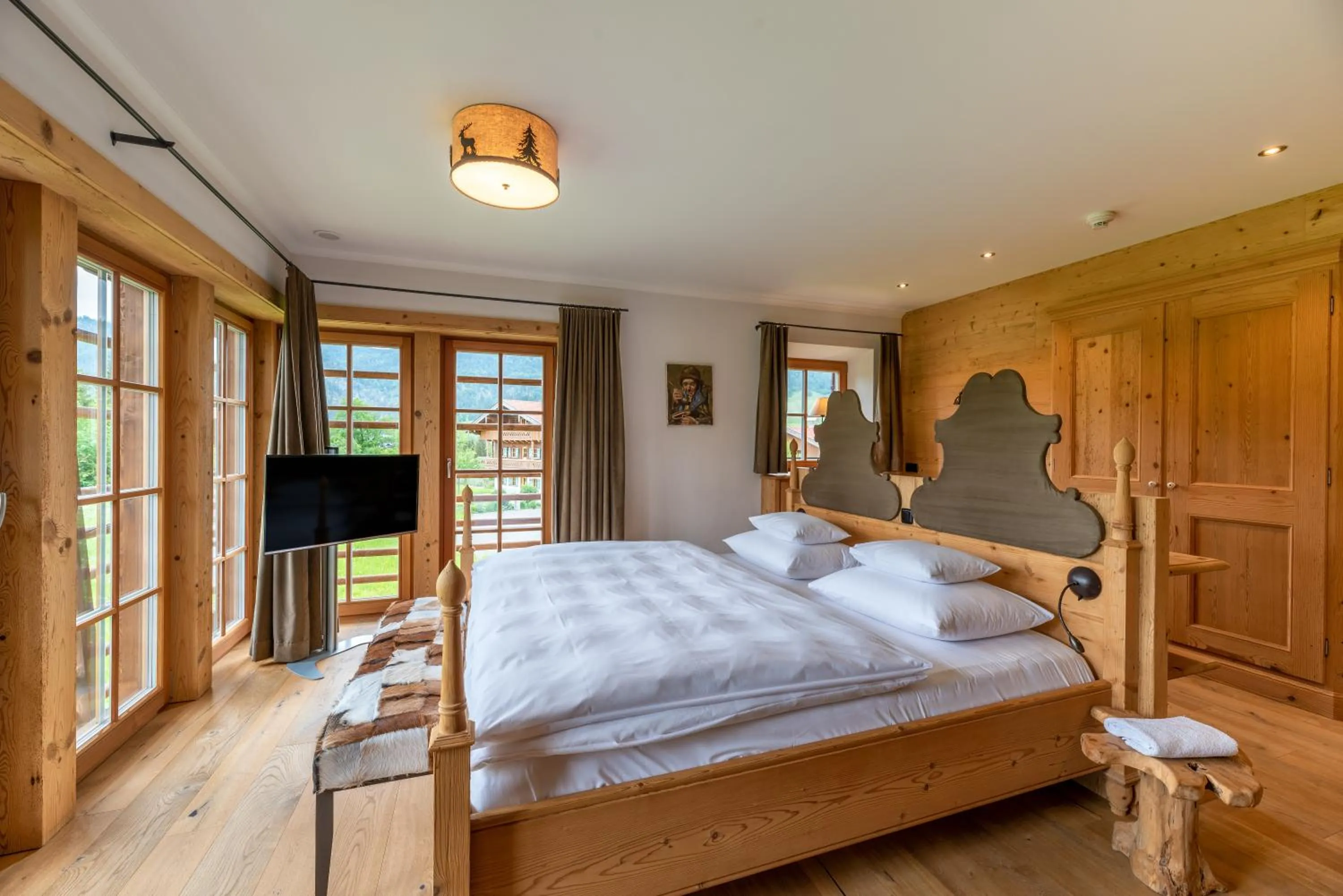 Bed in Relais & Châteaux Gut Steinbach Hotel Chalets SPA