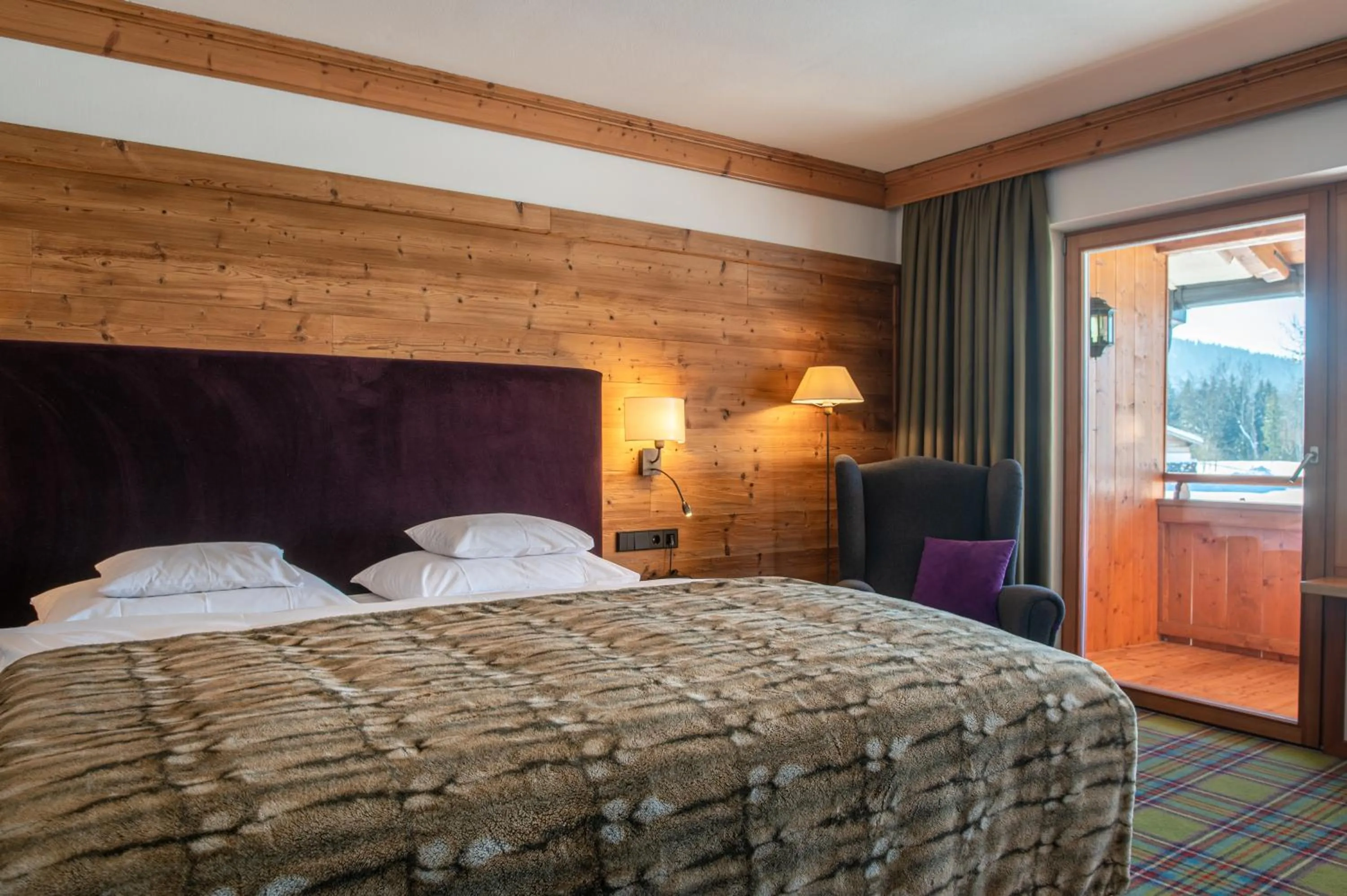 Bed in Relais & Châteaux Gut Steinbach Hotel Chalets SPA