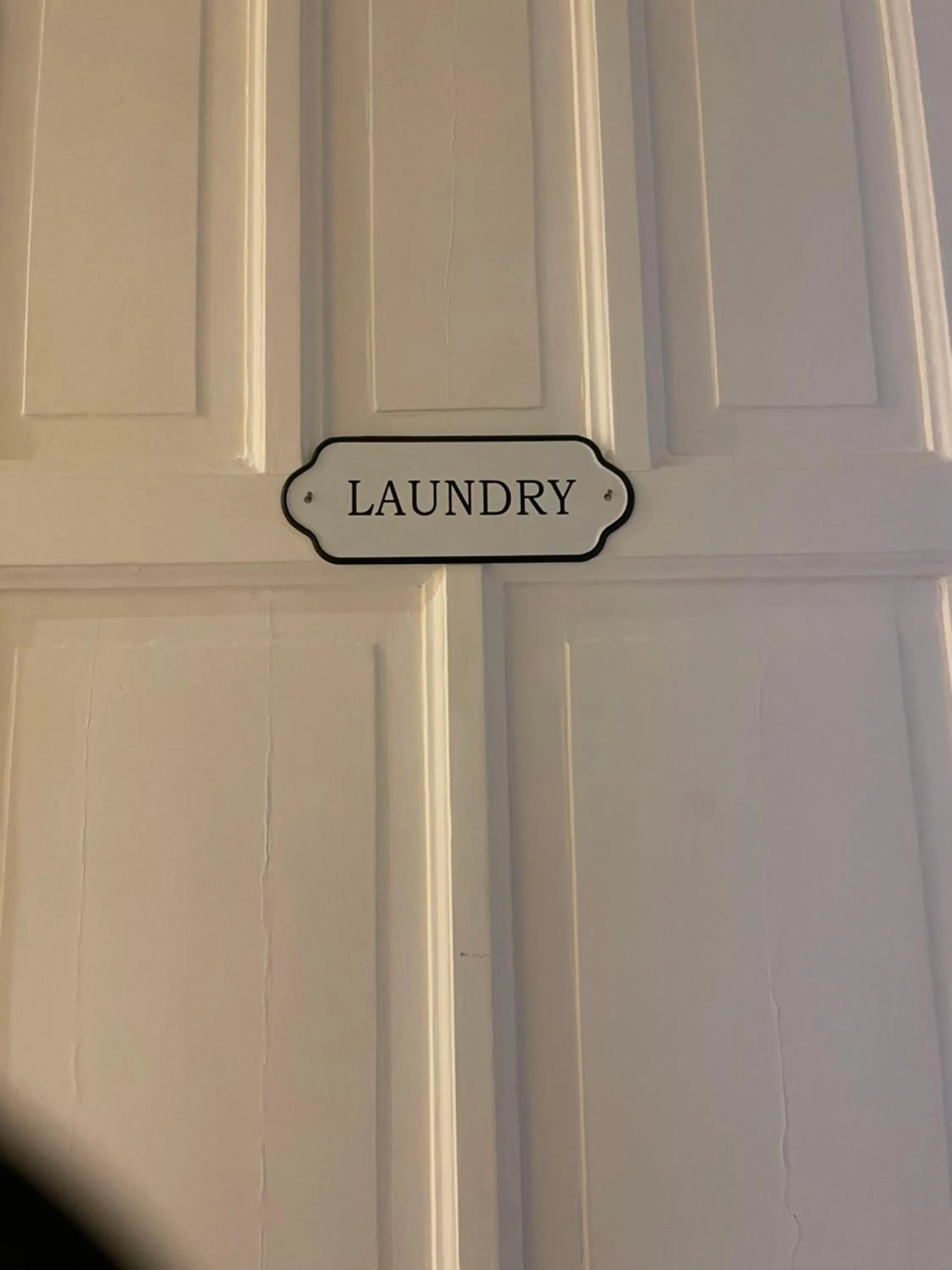 Text overlay in BARRIQUE Guest House