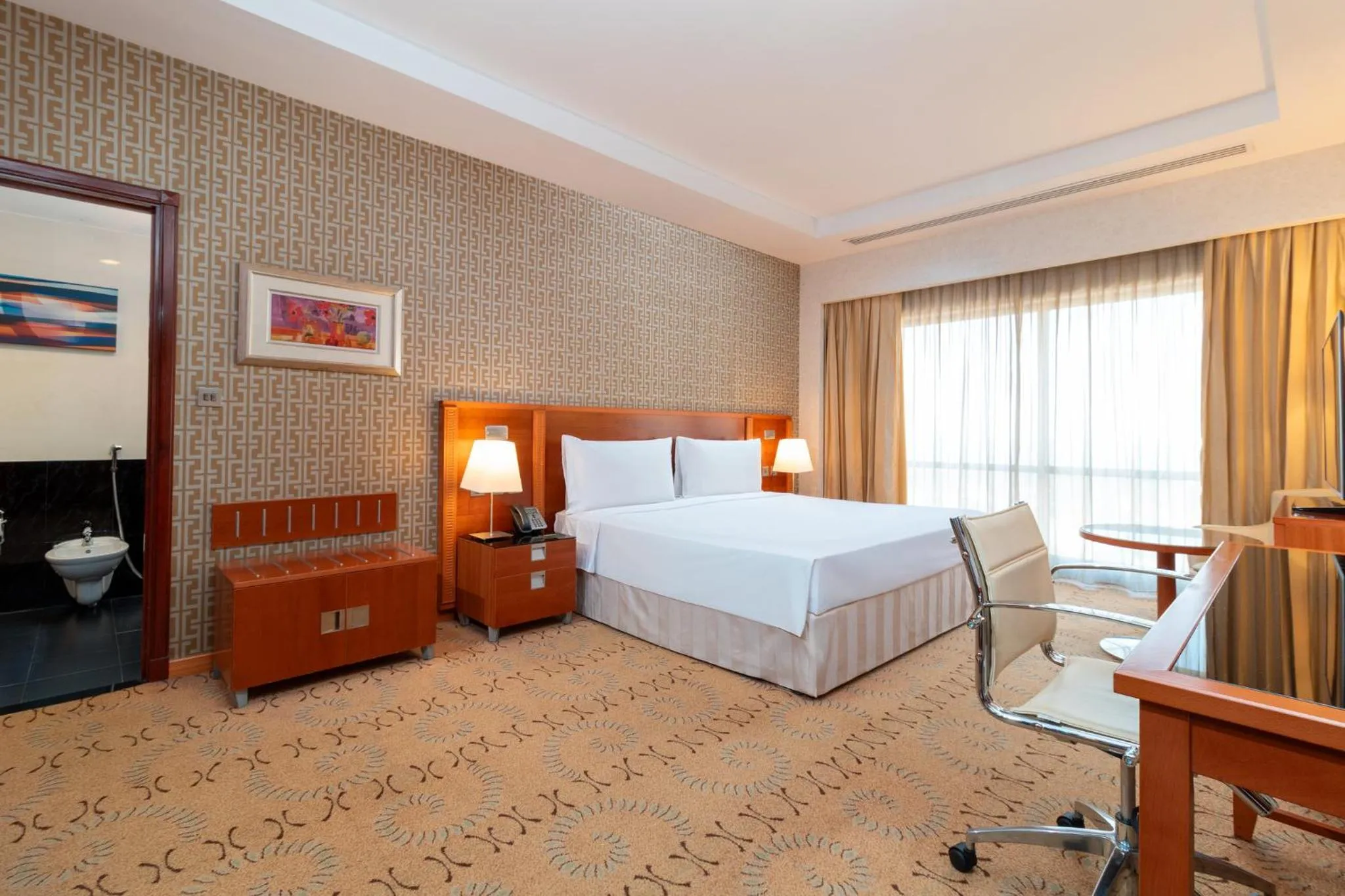 Photo of the whole room, Bed in Holiday Inn - Suites Kuwait Salmiya by IHG