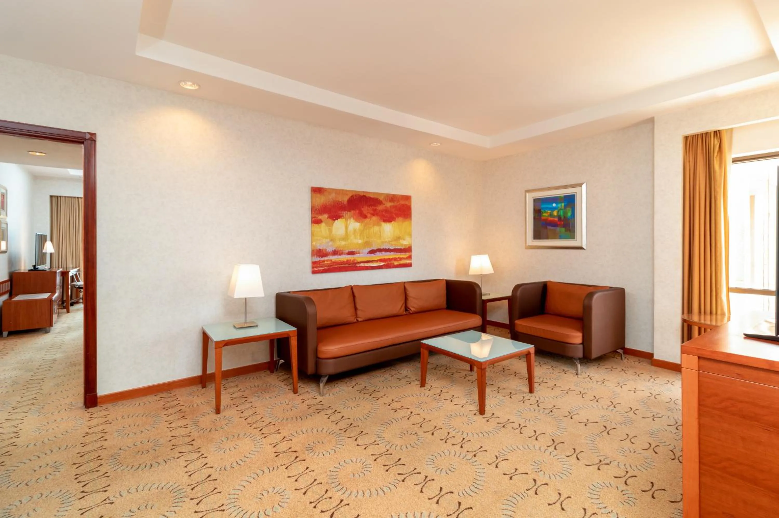 Living room in Holiday Inn - Suites Kuwait Salmiya by IHG