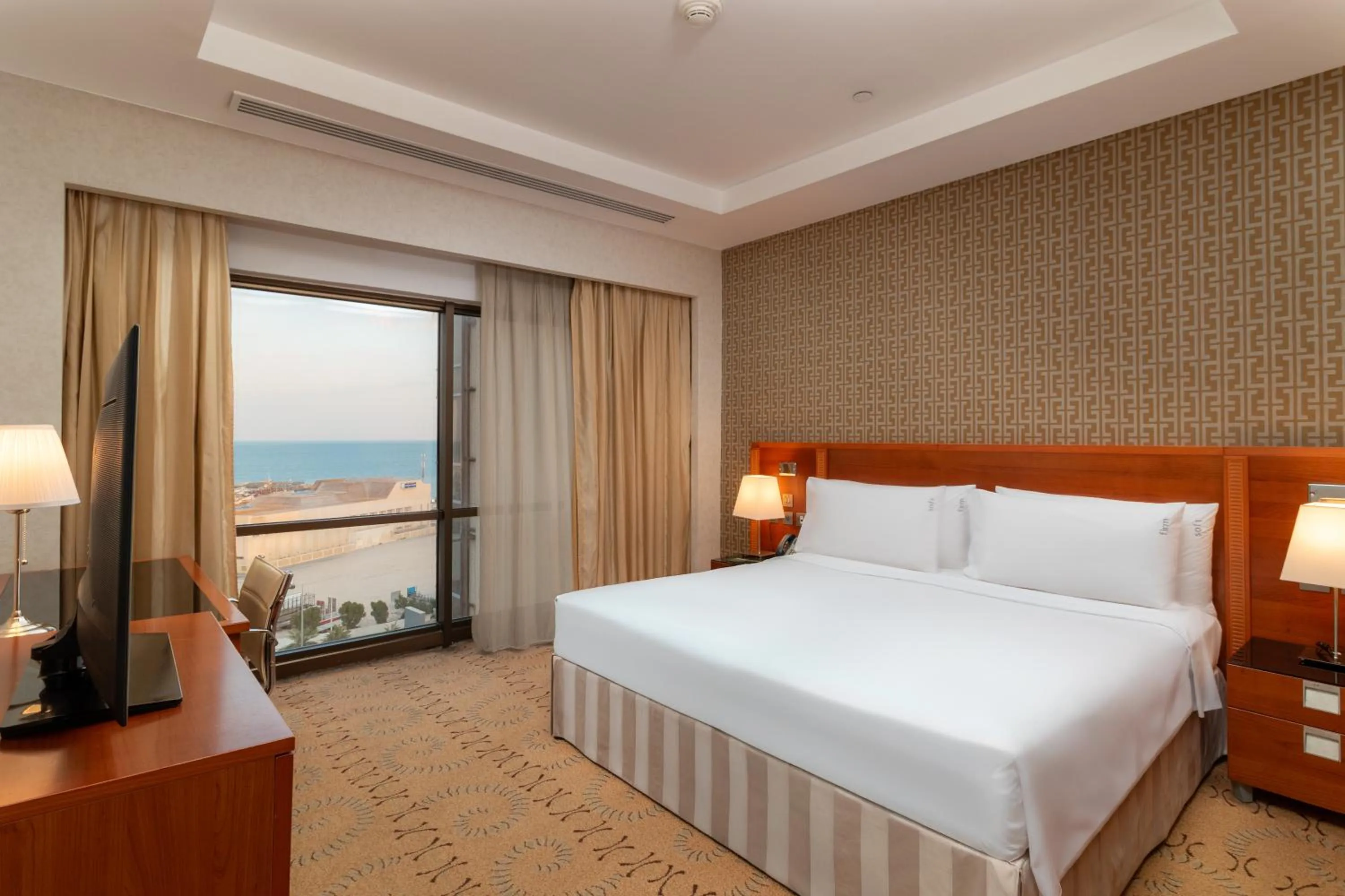 Bedroom, Bed in Holiday Inn - Suites Kuwait Salmiya by IHG