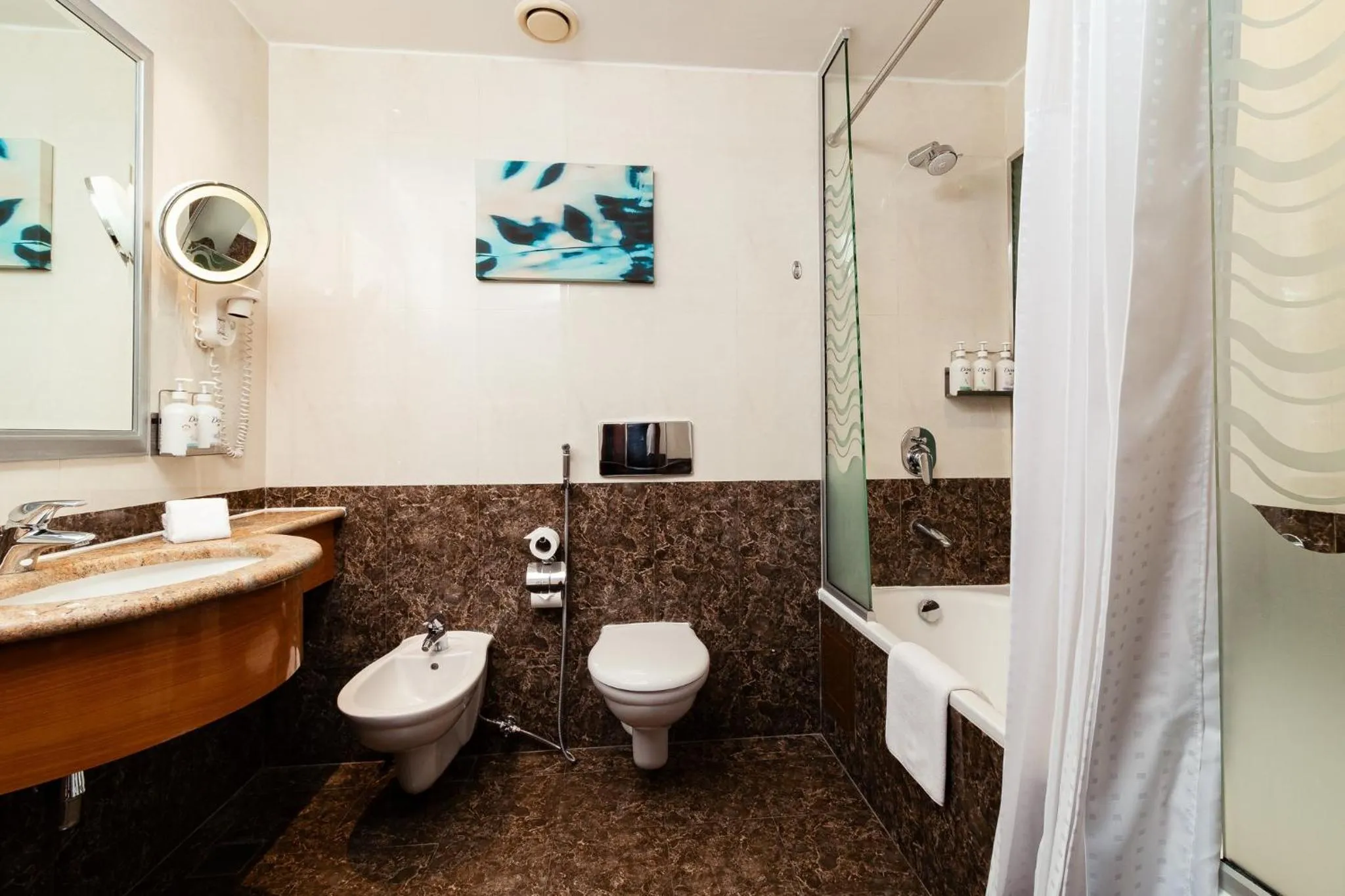 Bathroom in Holiday Inn - Suites Kuwait Salmiya by IHG