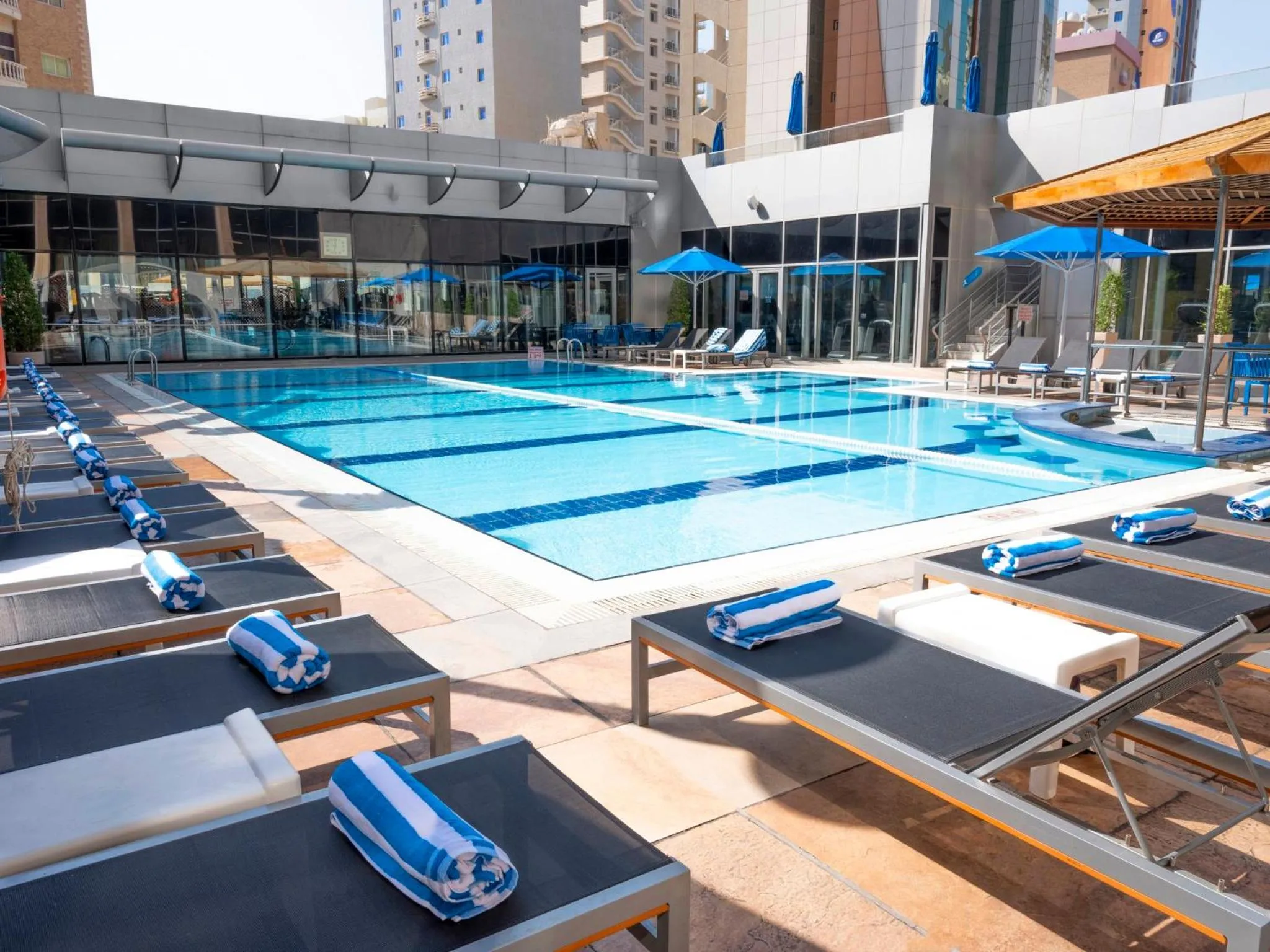 Swimming pool in Holiday Inn - Suites Kuwait Salmiya by IHG