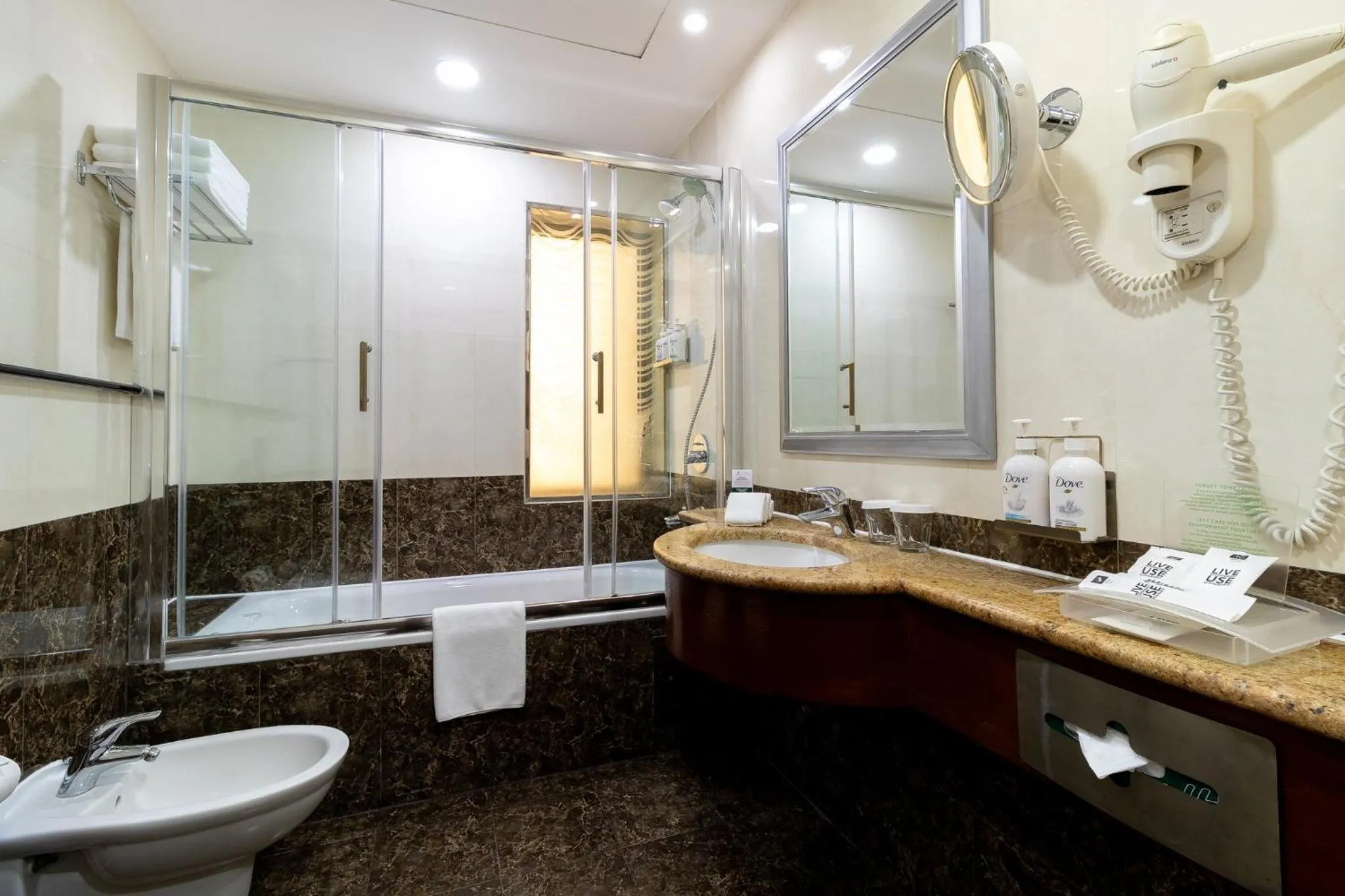 Bathroom in Holiday Inn - Suites Kuwait Salmiya by IHG