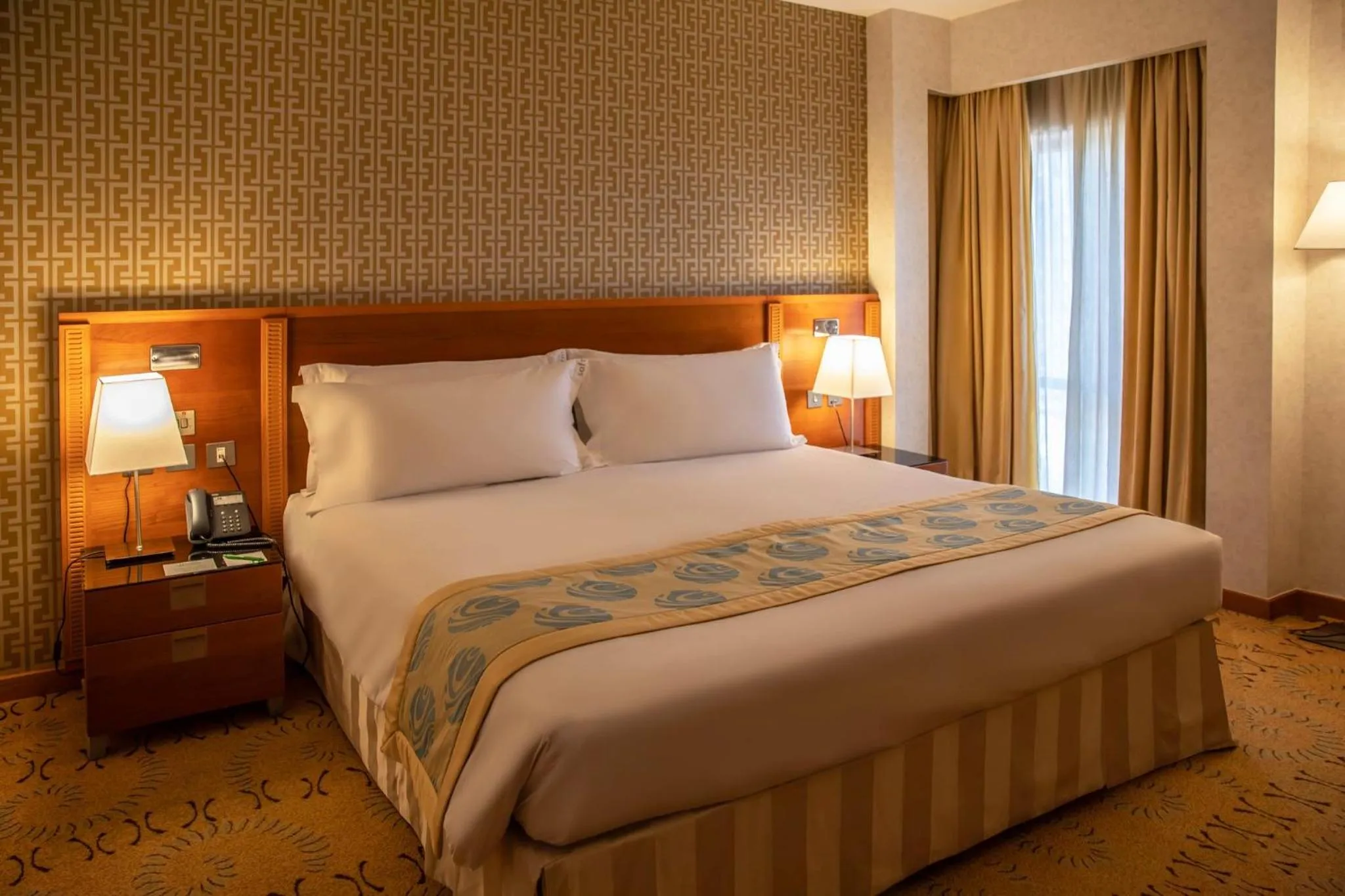 Photo of the whole room, Bed in Holiday Inn - Suites Kuwait Salmiya by IHG