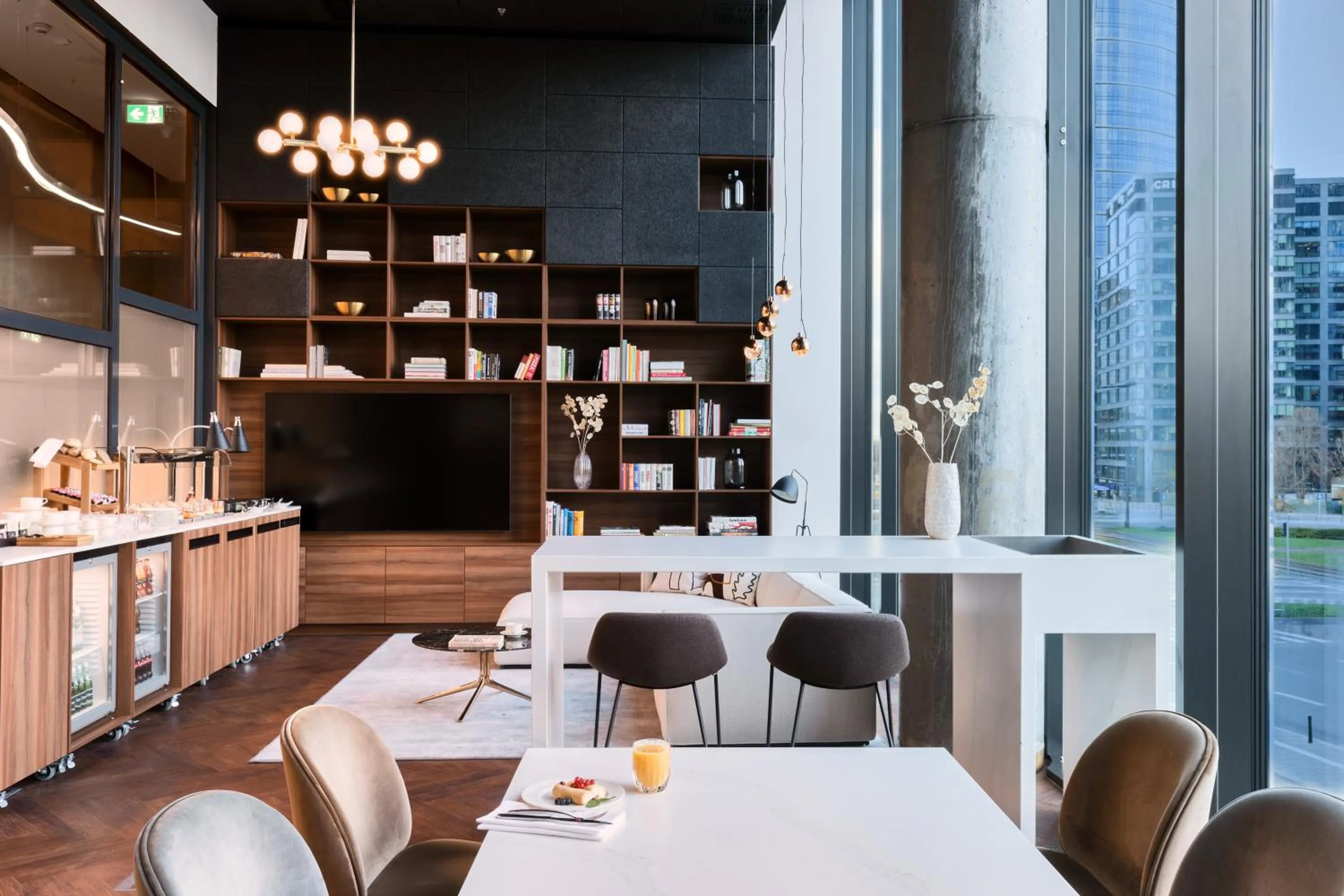 Communal lounge/ TV room in Crowne Plaza - Warsaw - The HUB by IHG