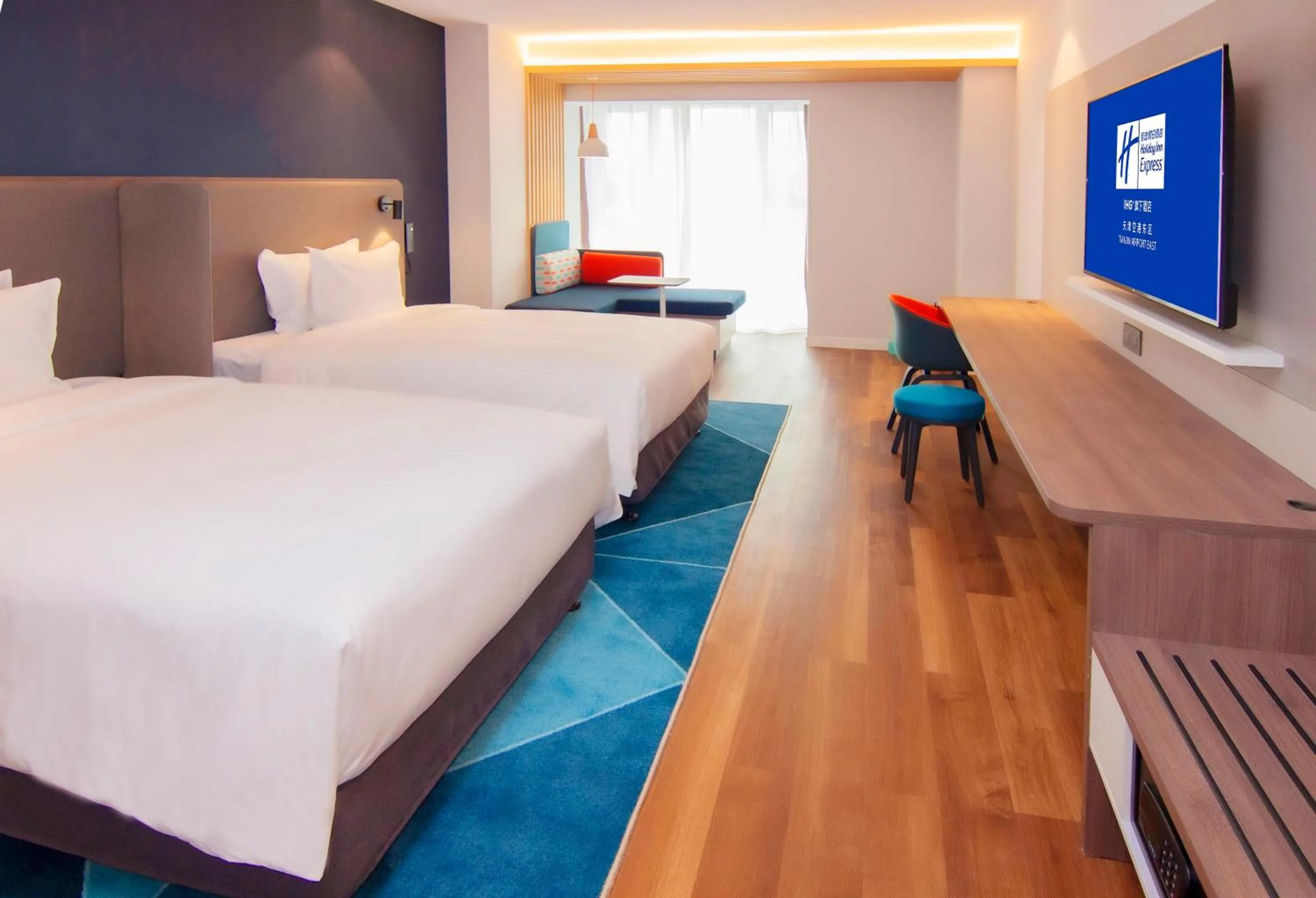 Photo of the whole room, Bed in Holiday Inn Express Tianjin Airport East by IHG