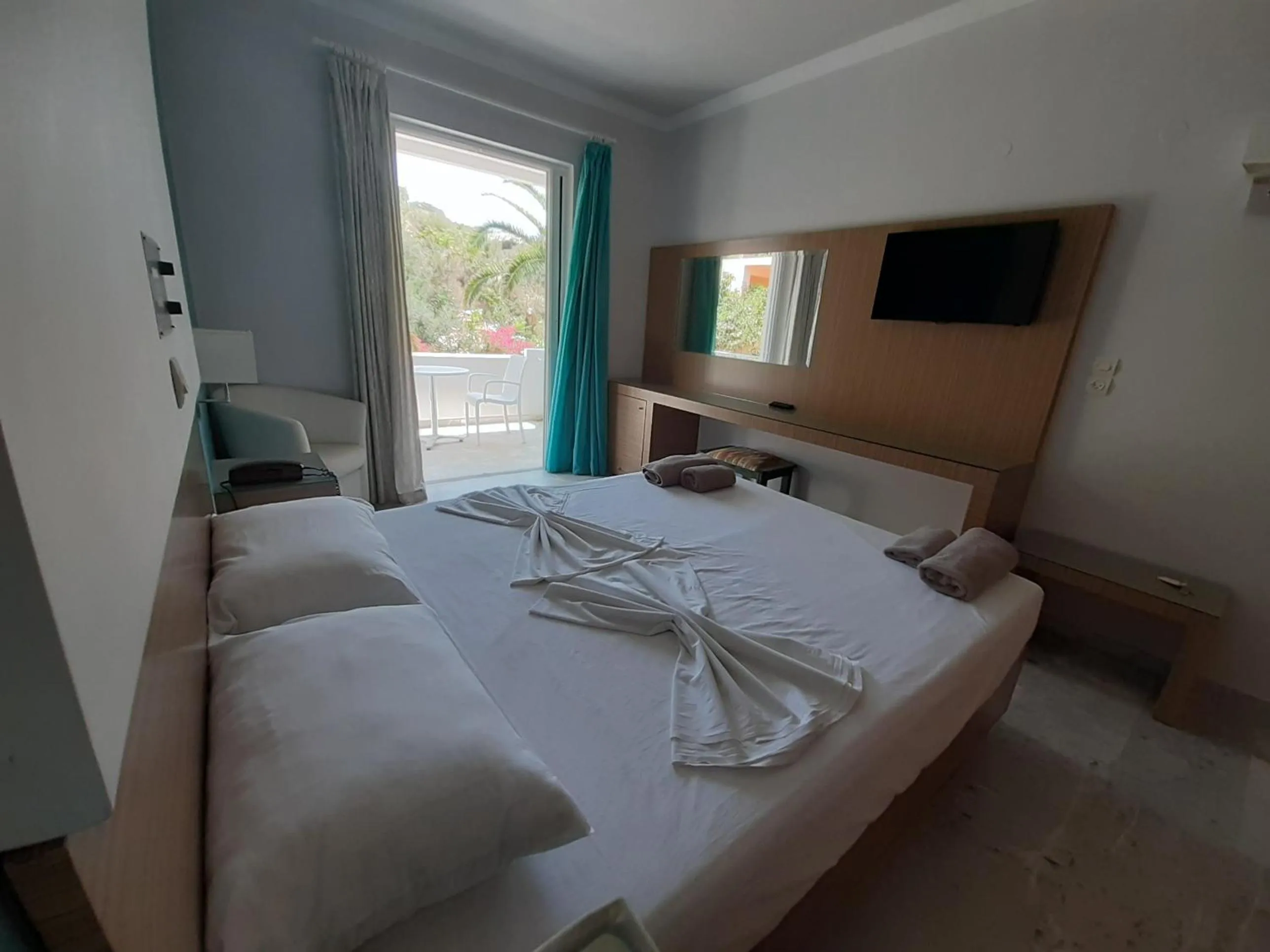 Bed in Kyriaki Hotel