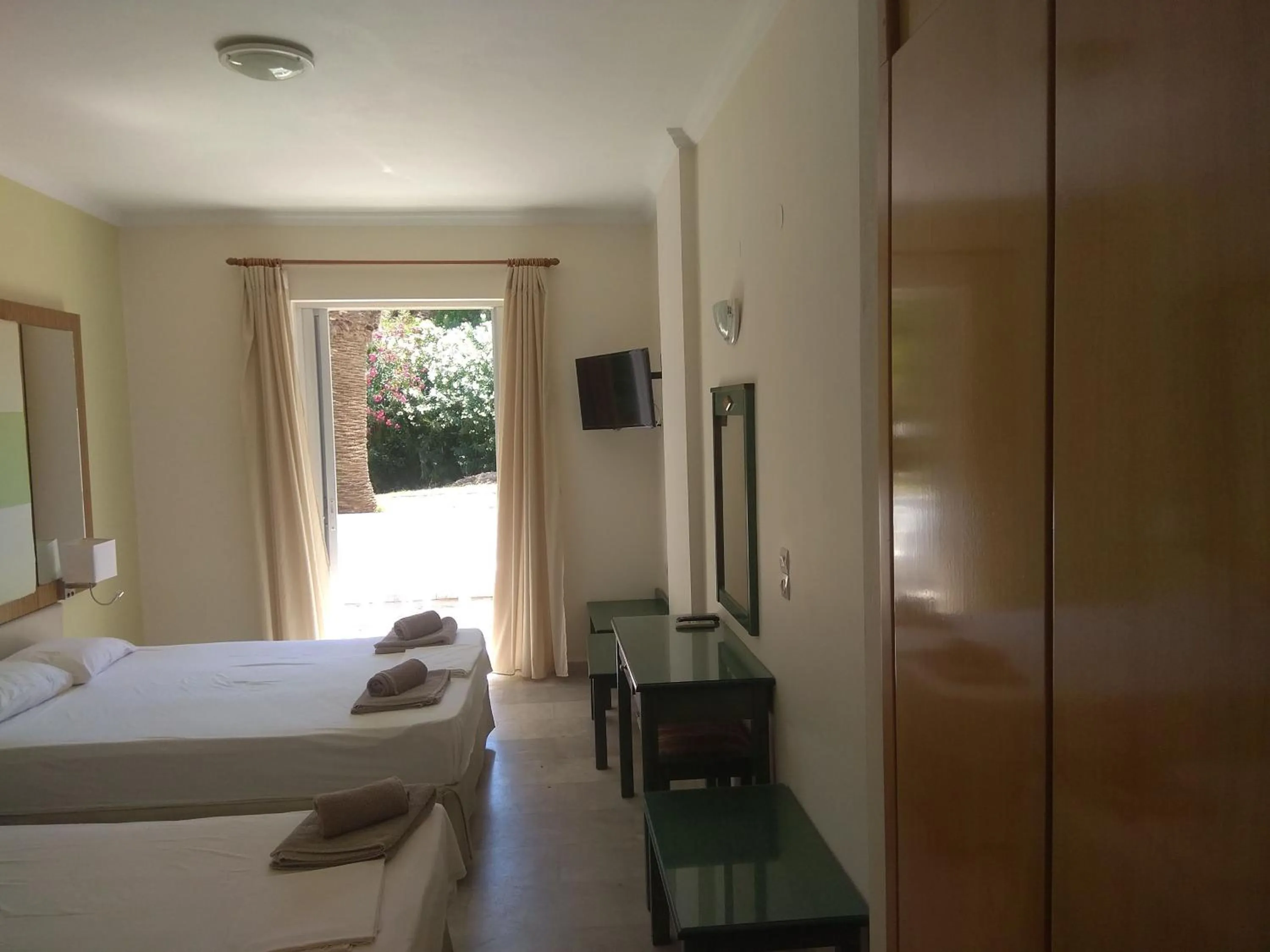 Bed in Kyriaki Hotel