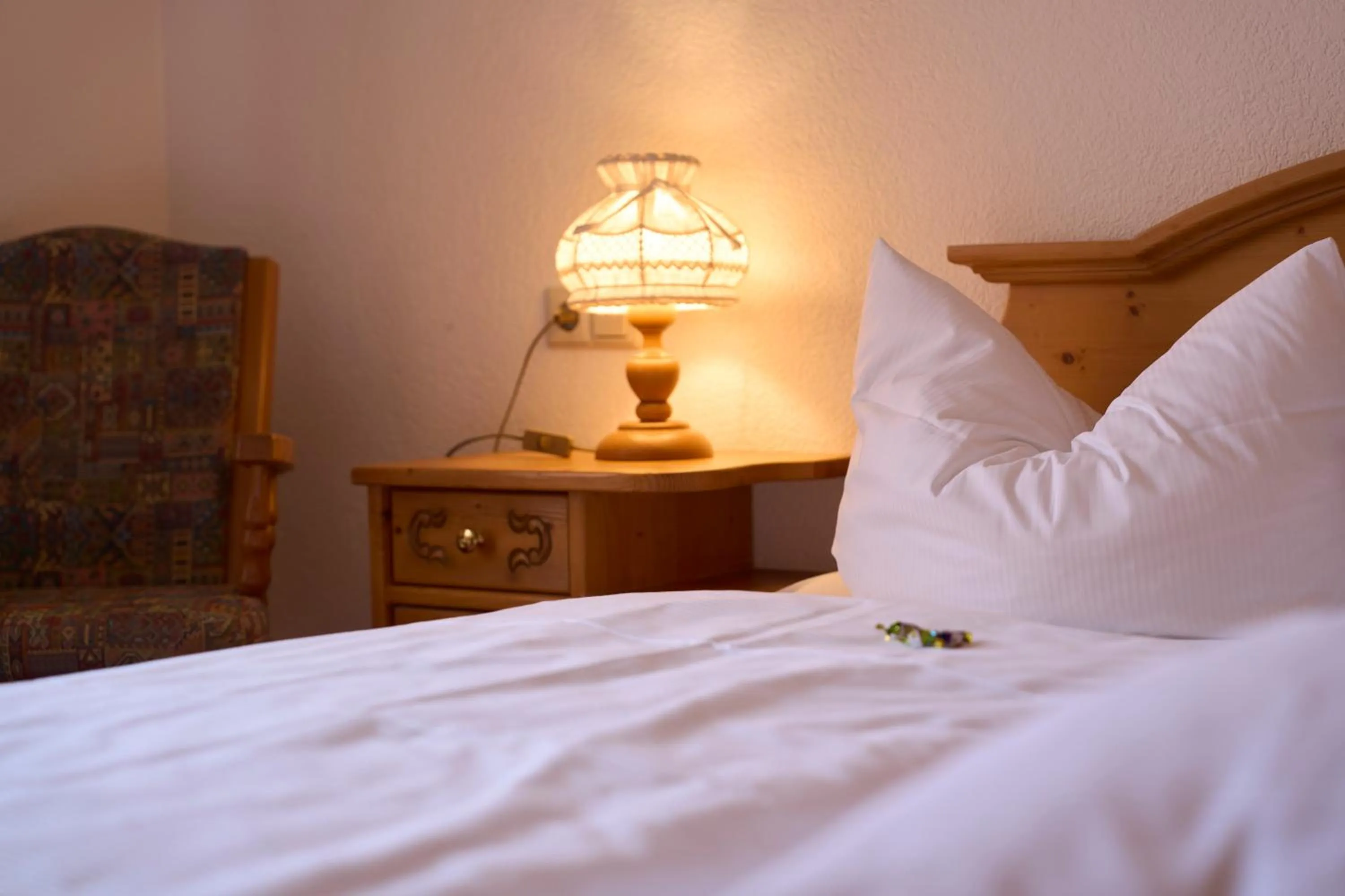 Bed in Hotel der Löwen in Staufen