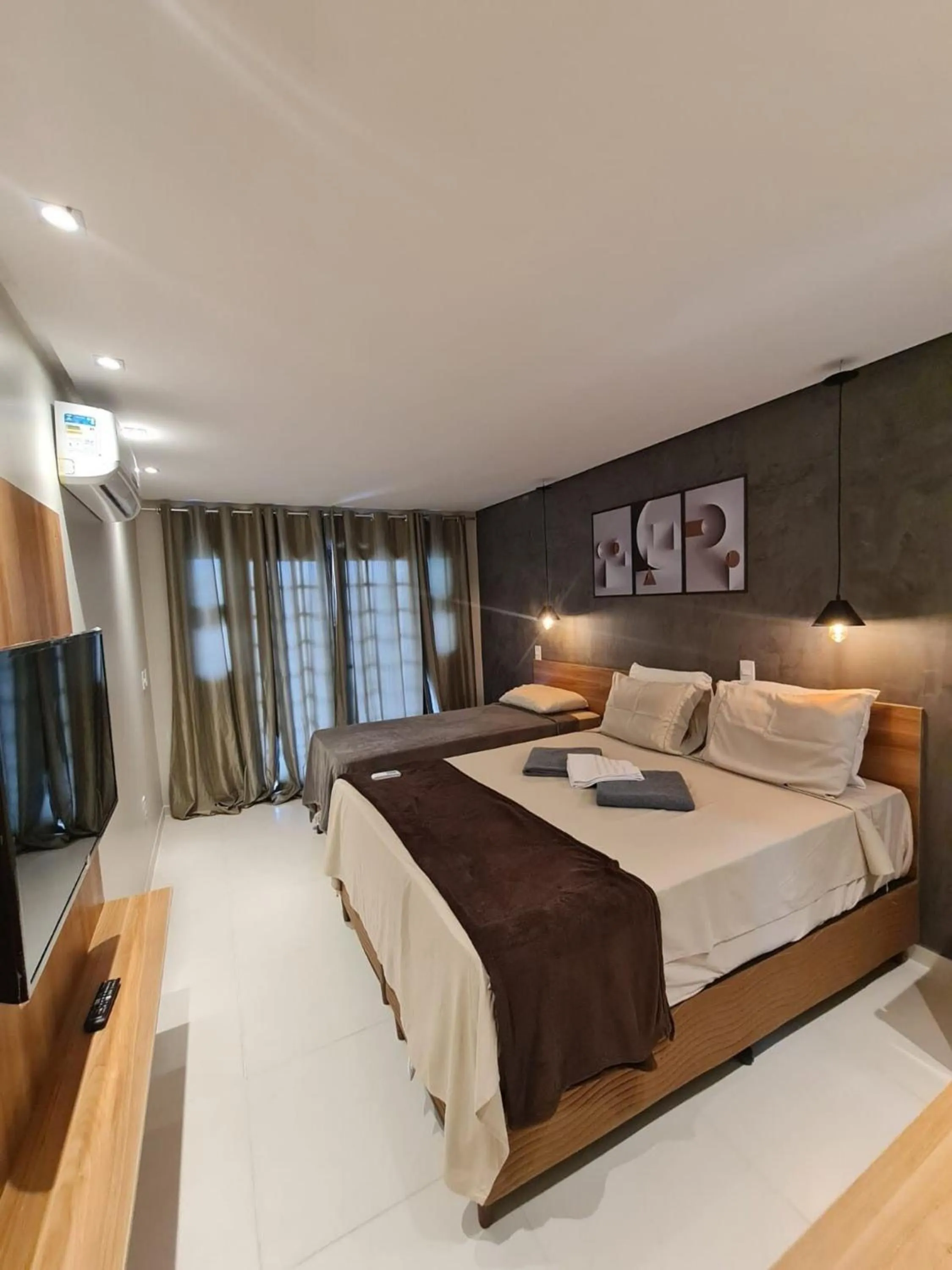 Bed in Pousada Maré do Francês