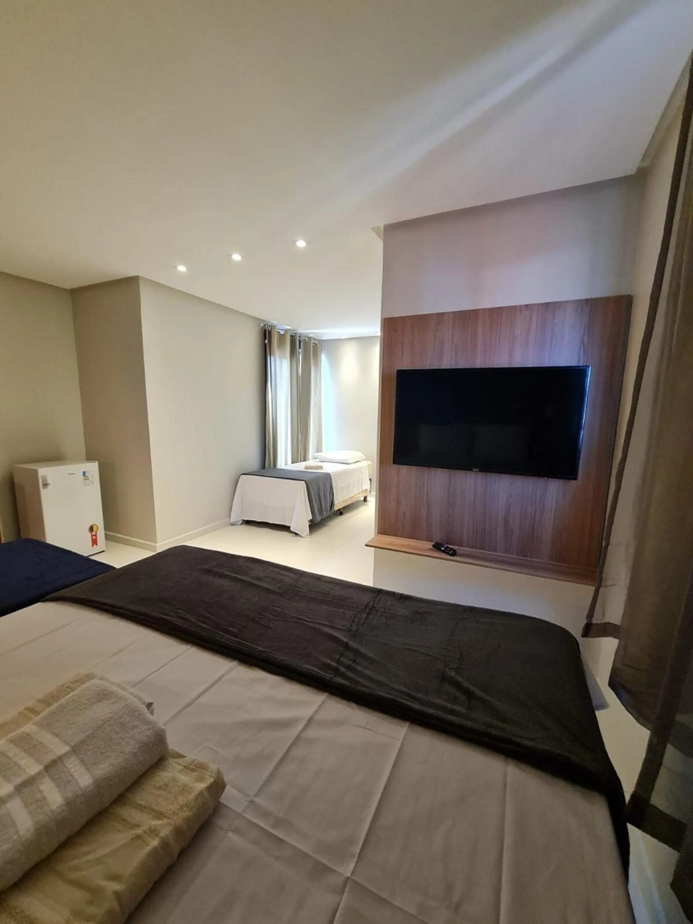 Bed in Pousada Maré do Francês