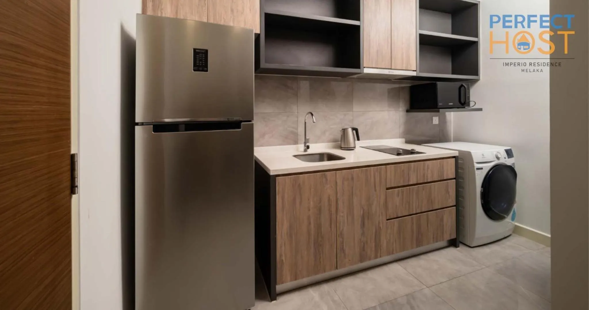 Kitchen or kitchenette in Imperio Residence Seafront by Perfect Host