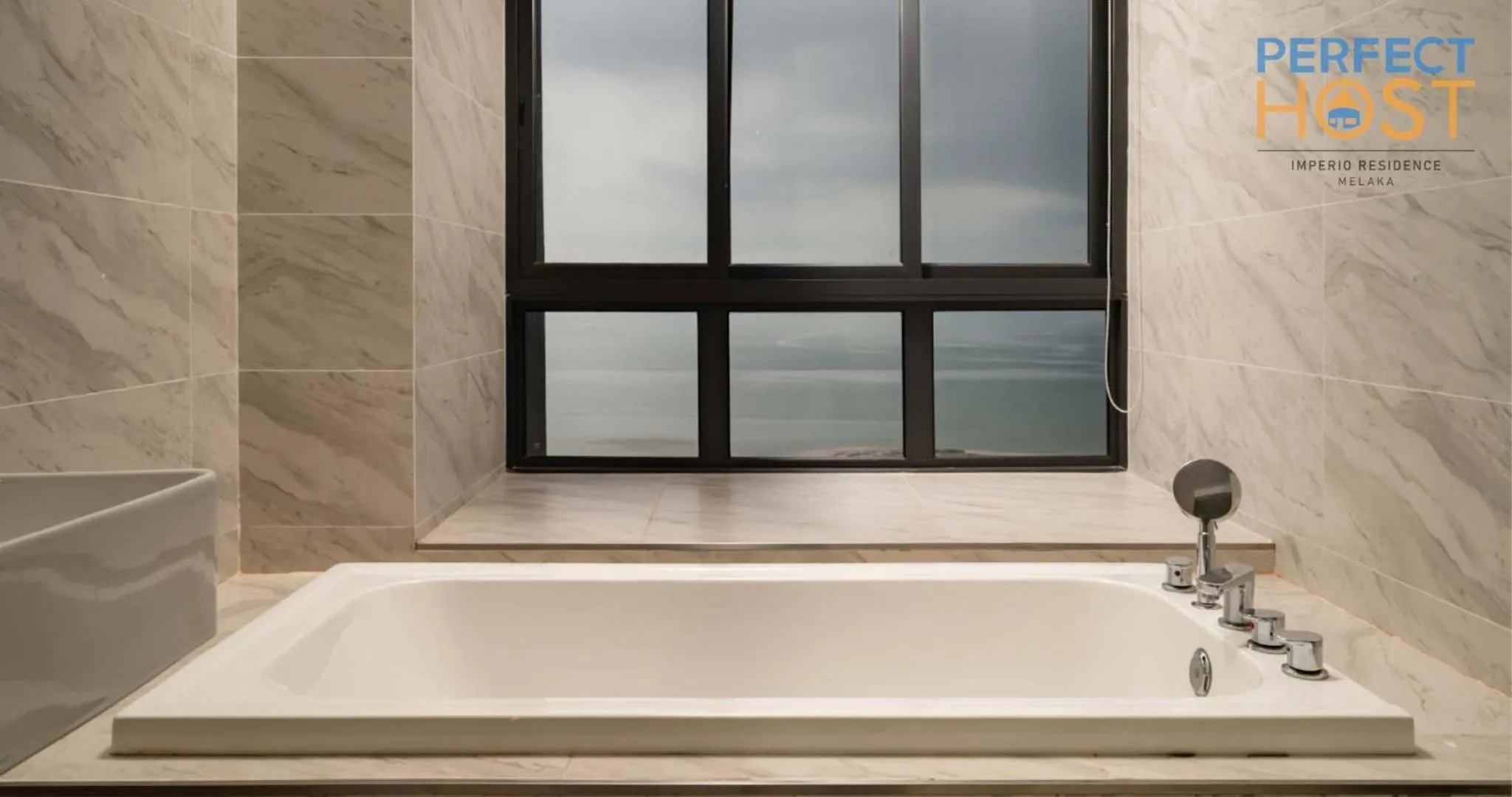 Bathroom in Imperio Residence Seafront by Perfect Host