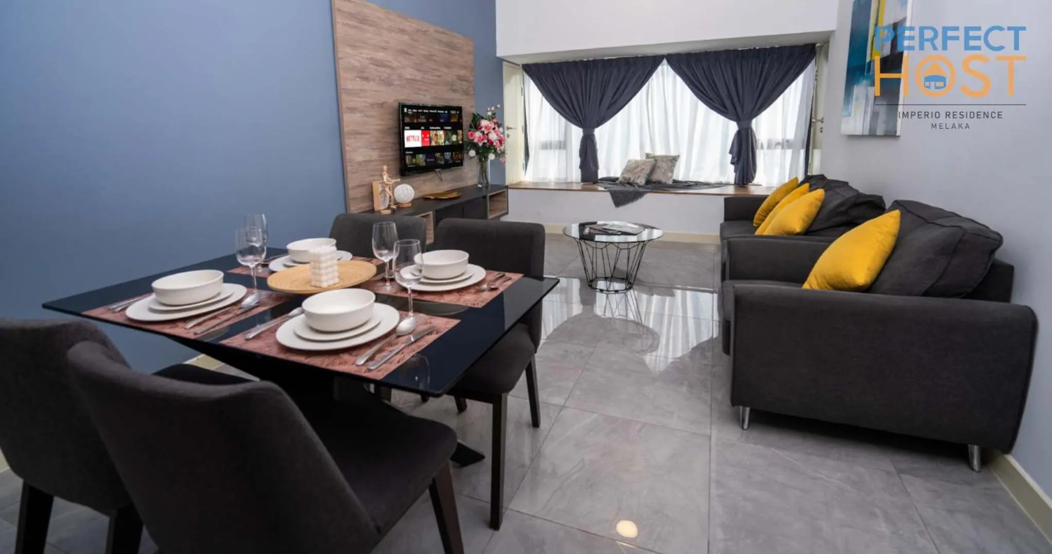 Living room in Imperio Residence Seafront by Perfect Host