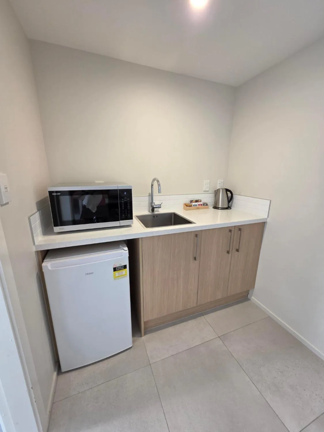 Kitchen or kitchenette in Kaikoura Beach Motel