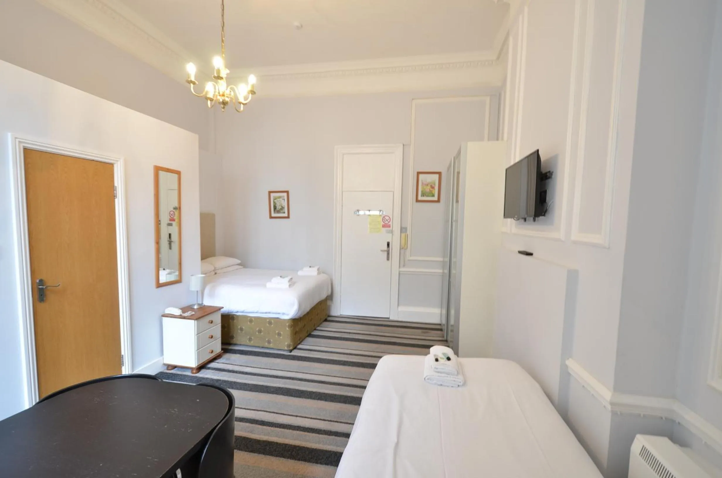 Bedroom in Amber Residence Hotel-Suites