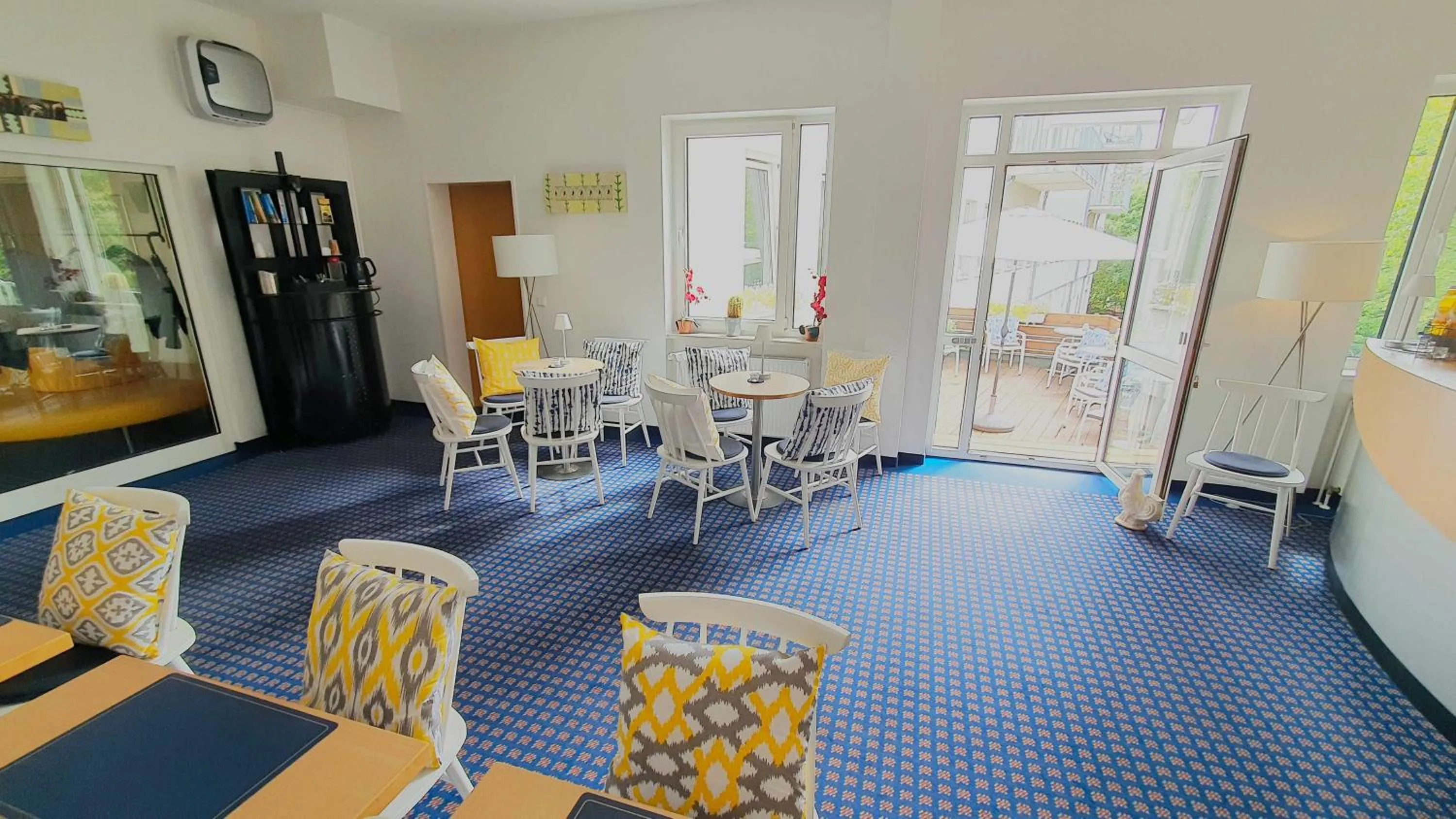 Communal lounge/ TV room in Hotel in Herrenhausen