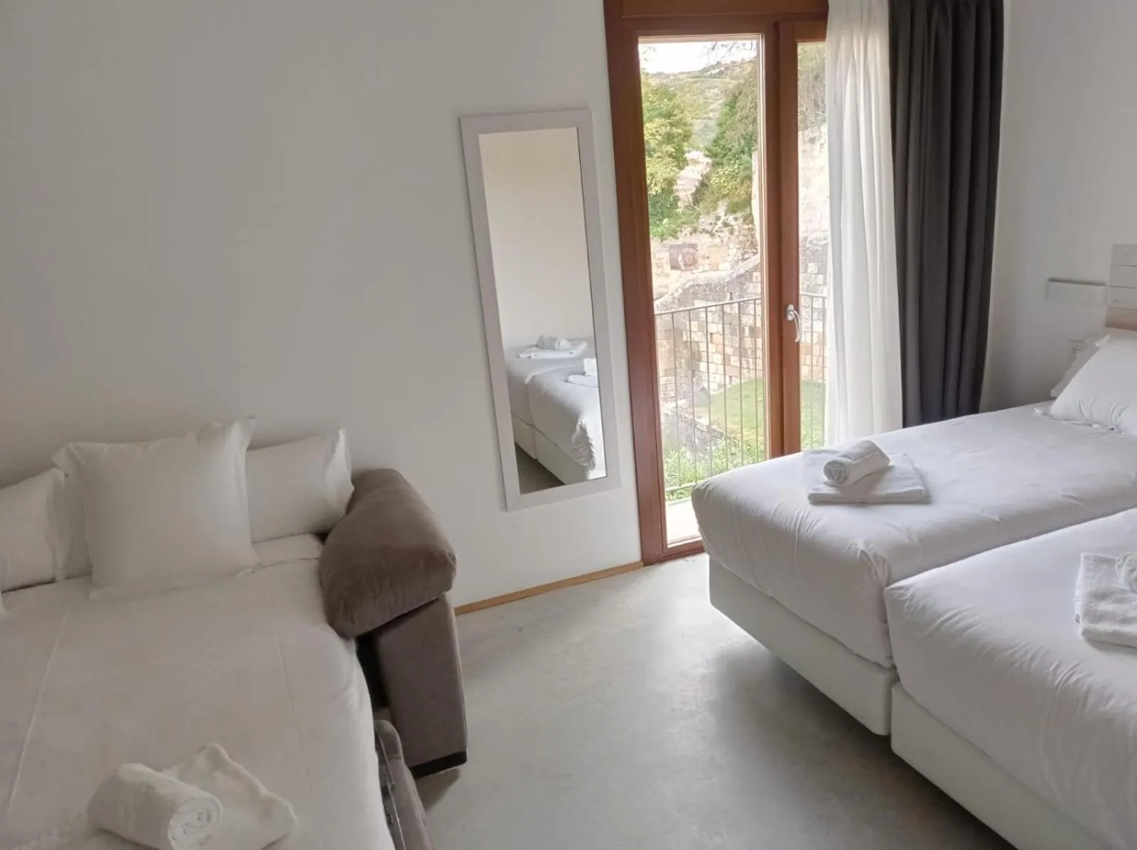 Bed in IRAIPE Estella Rooms Auto Check-in