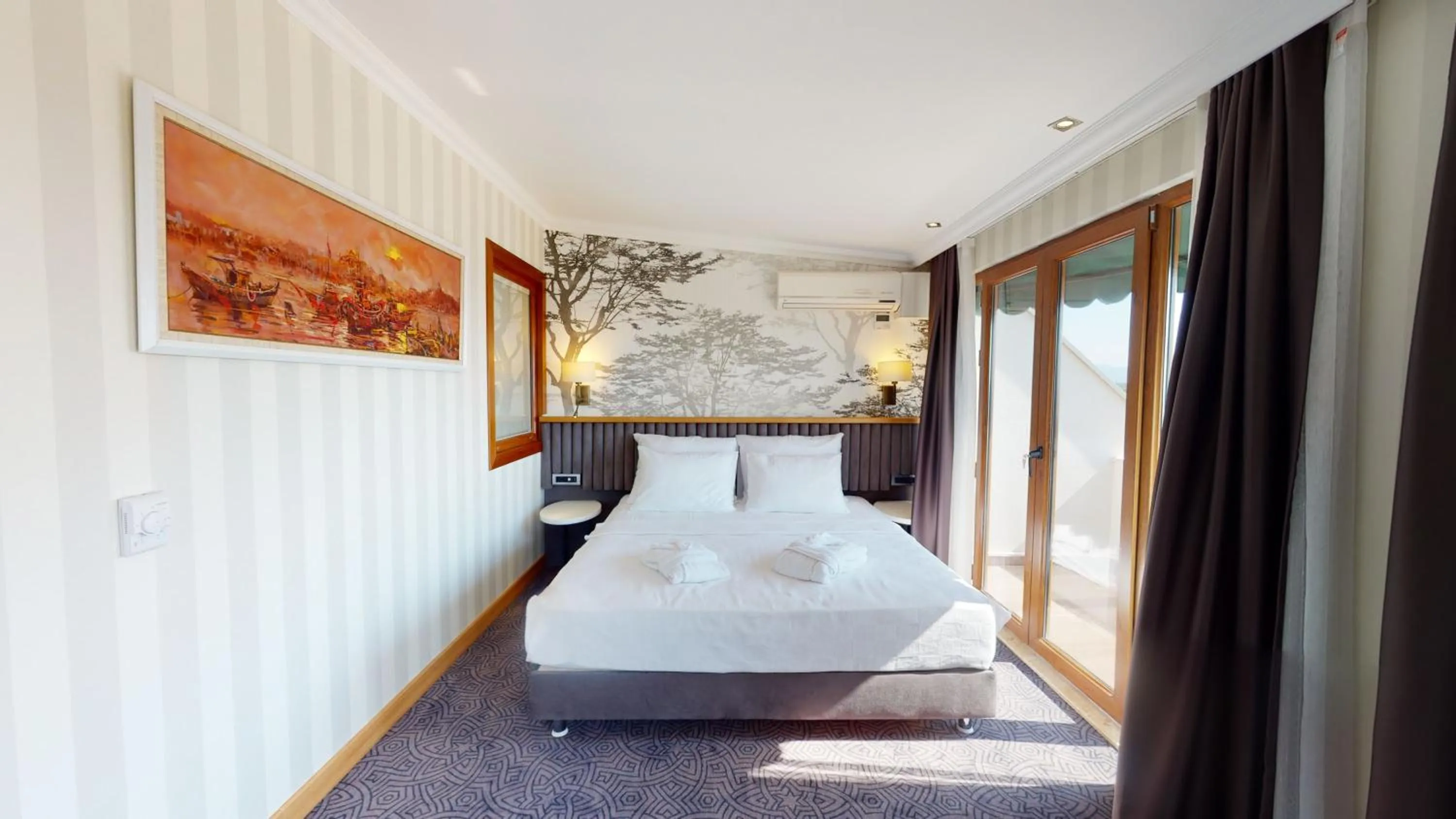 Bed in DOUBLE ROYAL HOTEL