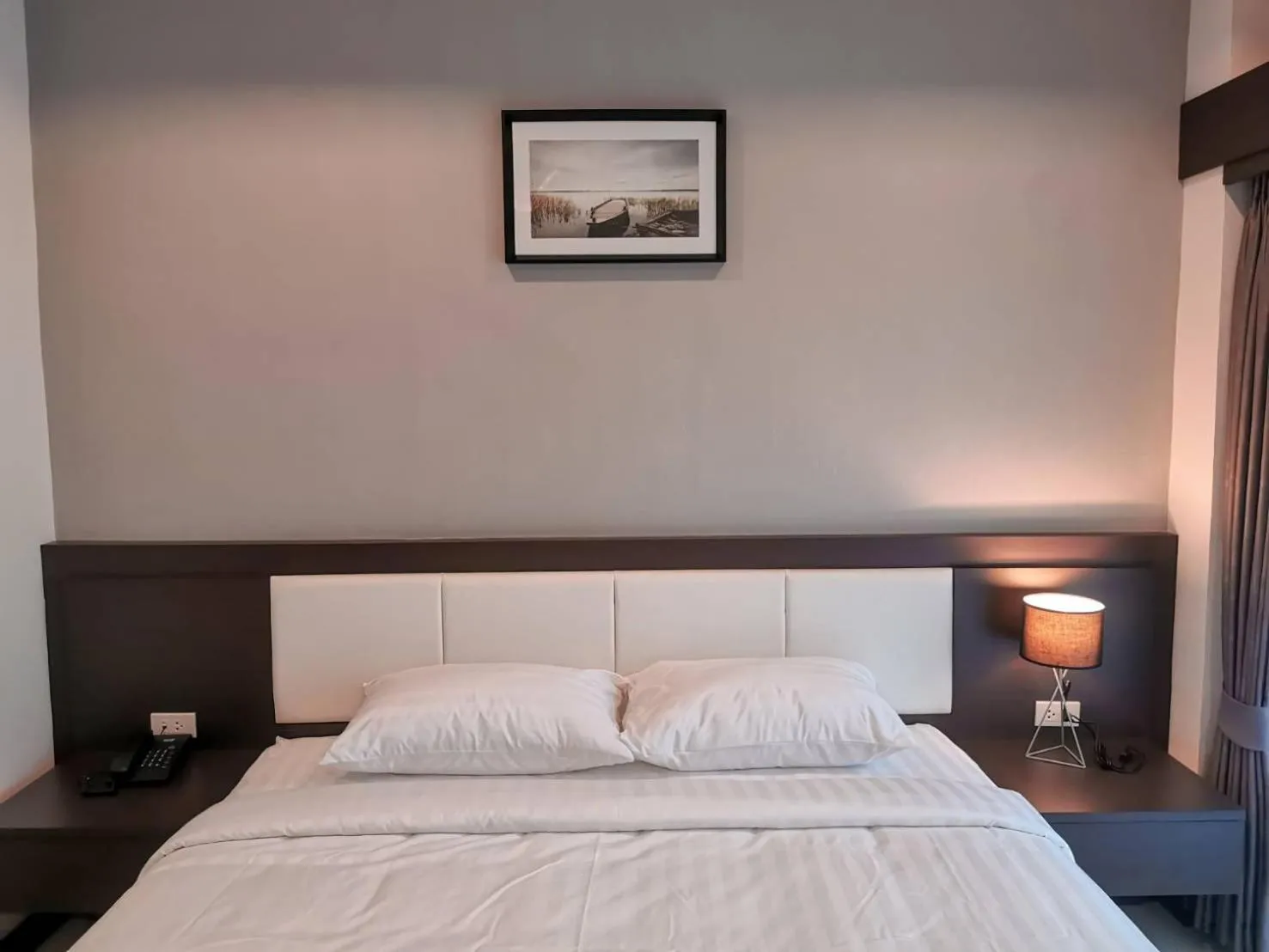 Bed in The Cottage Hotel Udon Thani