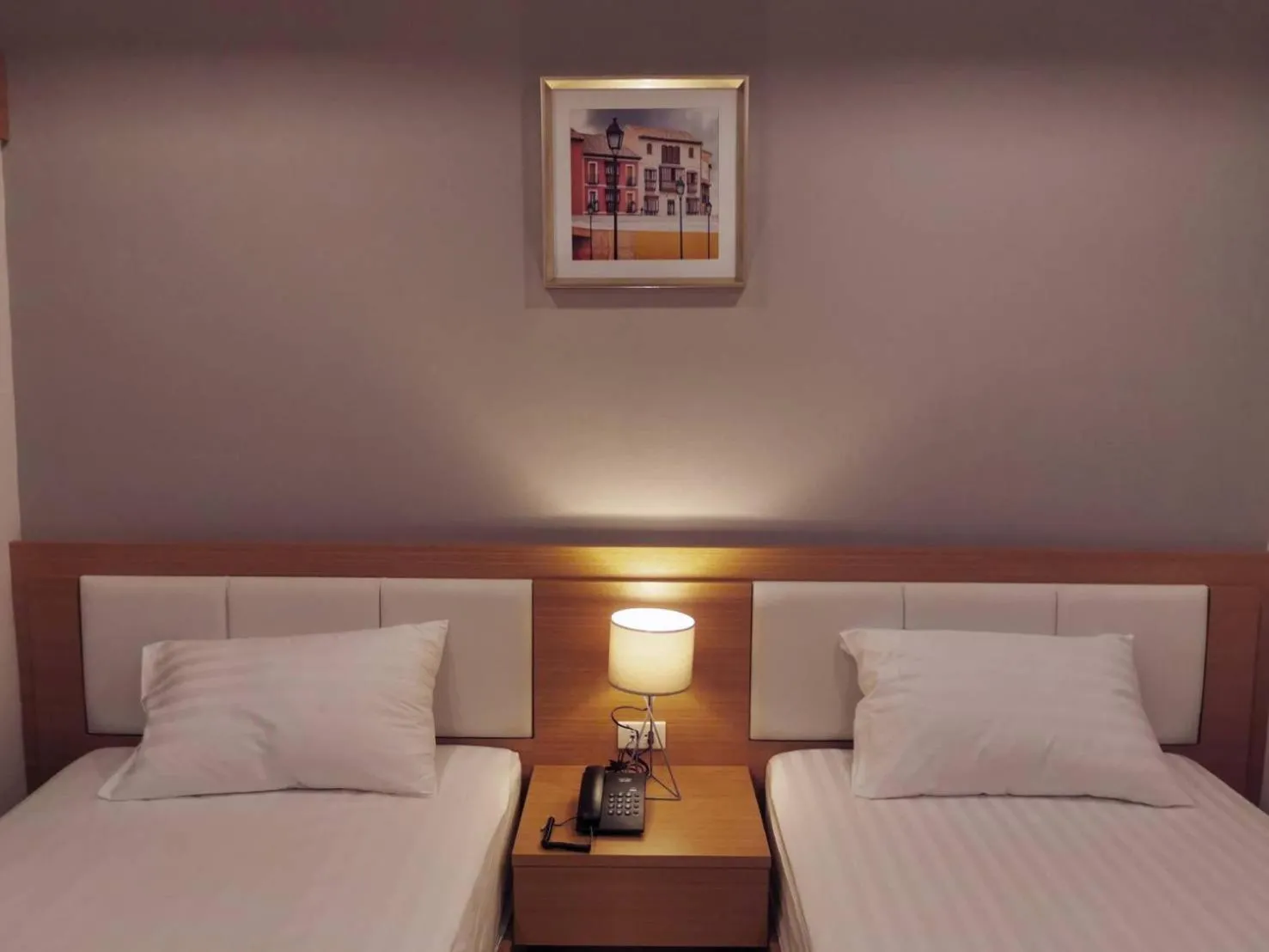 Bed in The Cottage Hotel Udon Thani