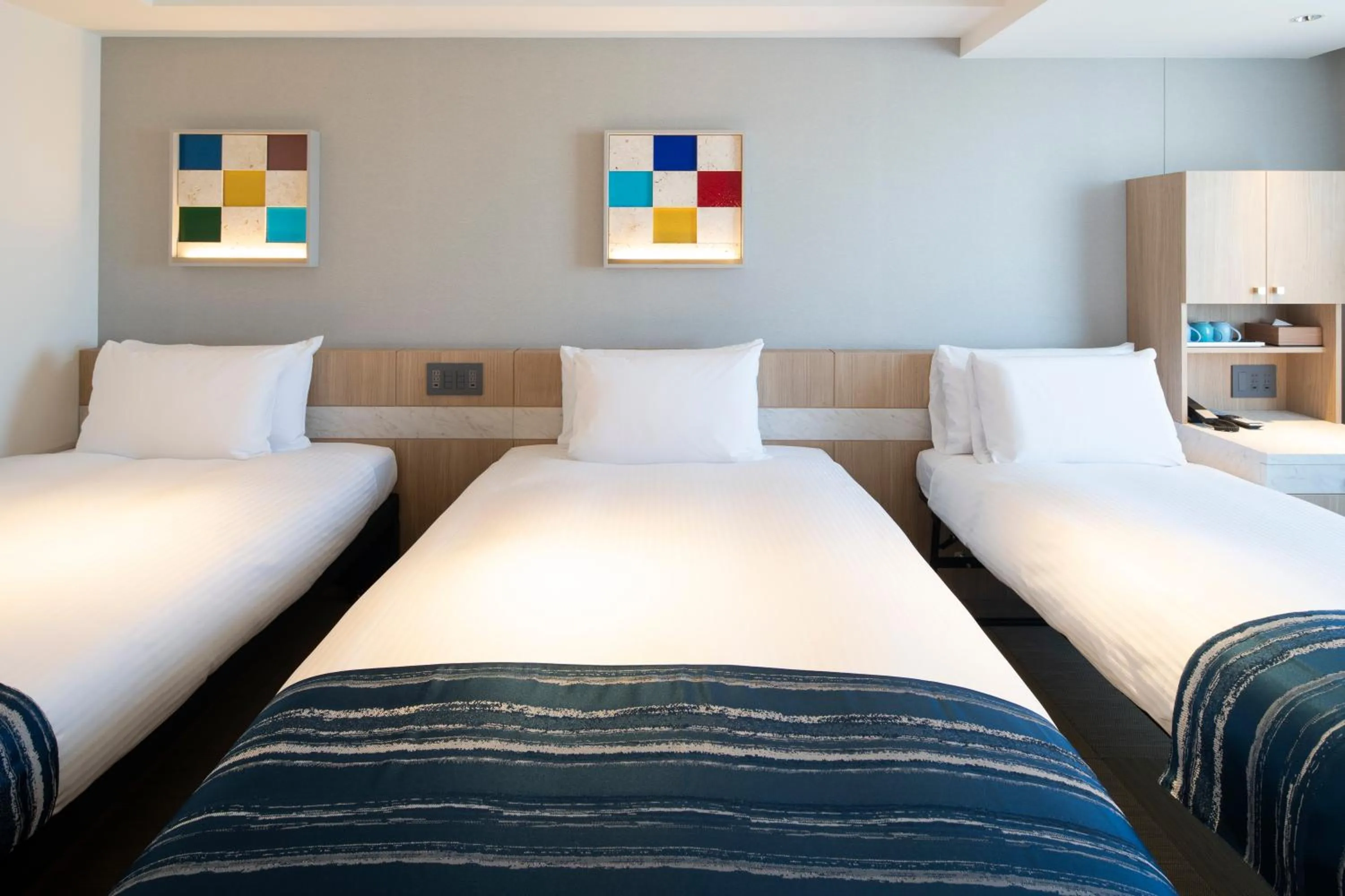 Bed in Okinawa Hinode Resort and Hot Spring Hotel