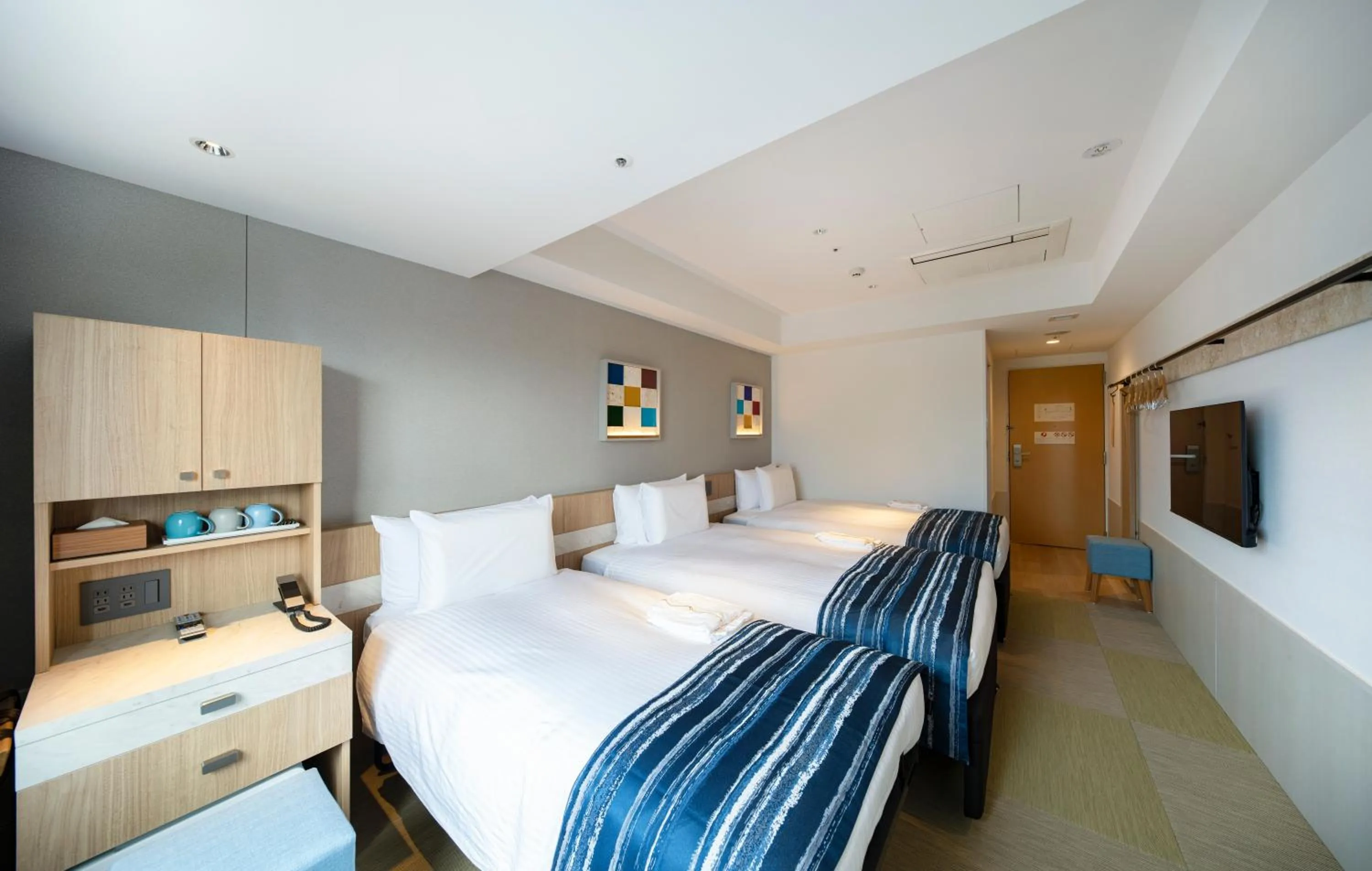 Bed in Okinawa Hinode Resort and Hot Spring Hotel