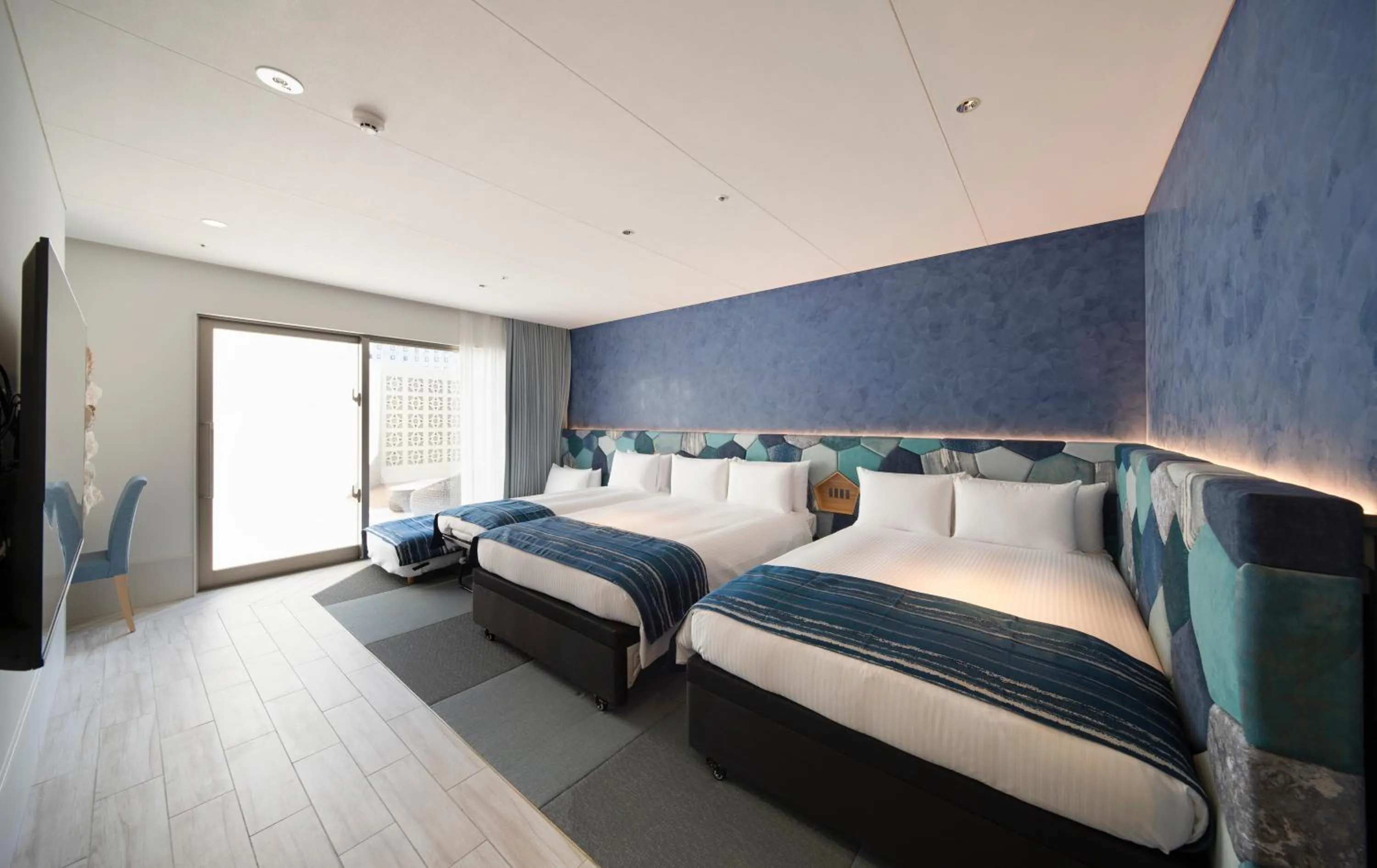 Photo of the whole room, Bed in Okinawa Hinode Resort and Hot Spring Hotel