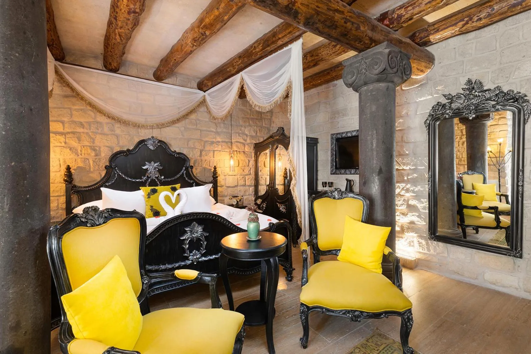 Bed in Elysion Cave Suites