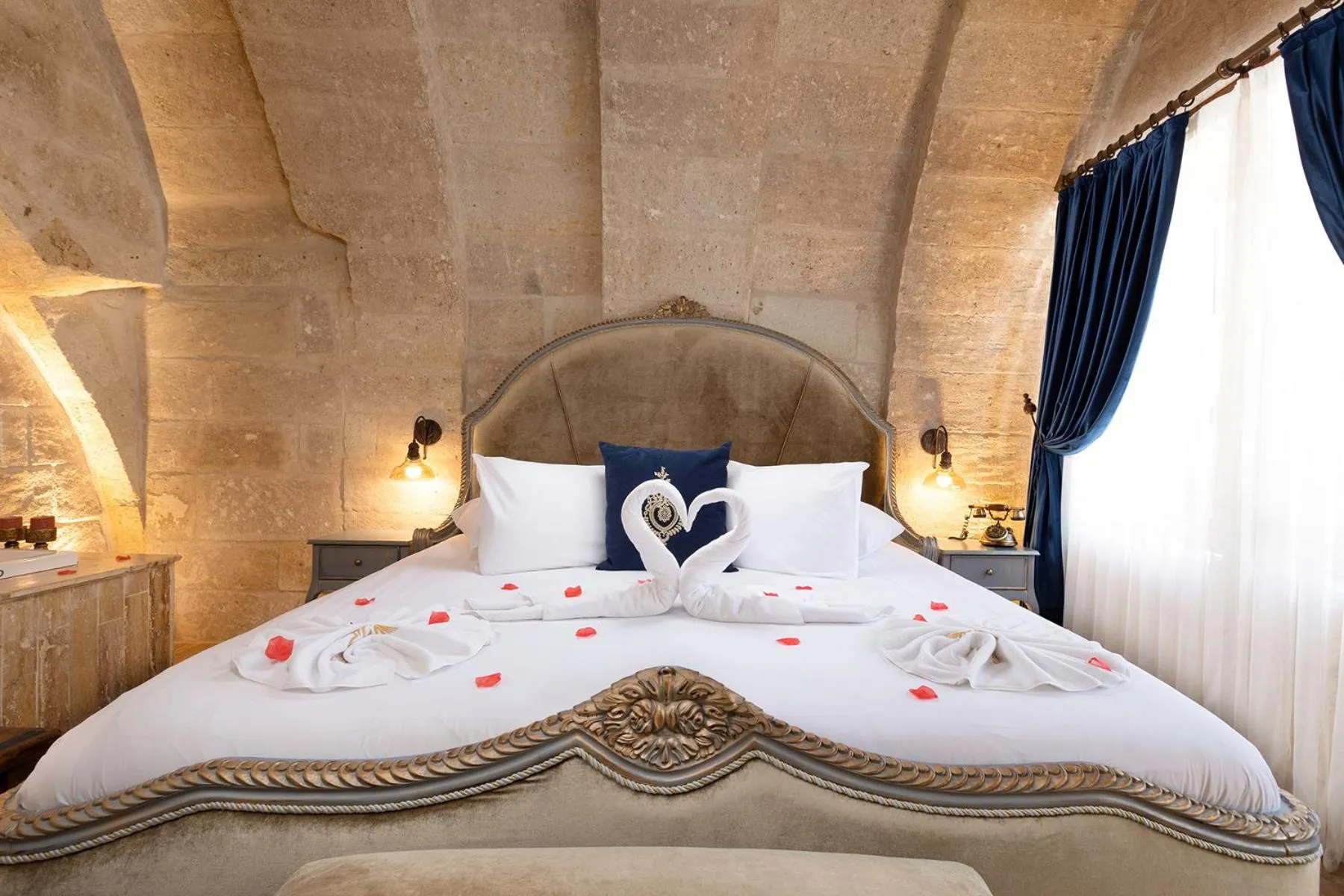 Bed in Elysion Cave Suites