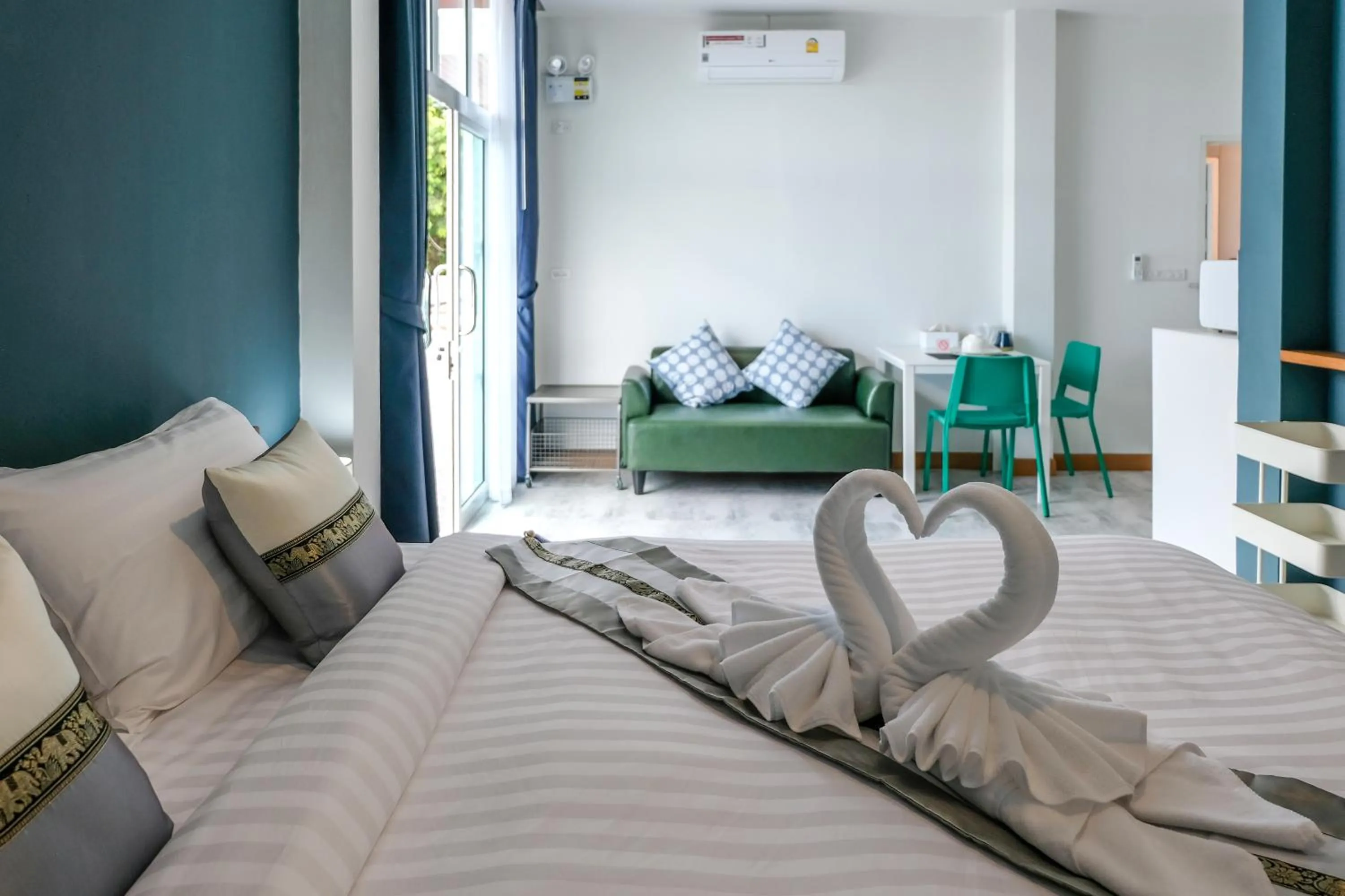 Living room, Bed in PaiApartHotel