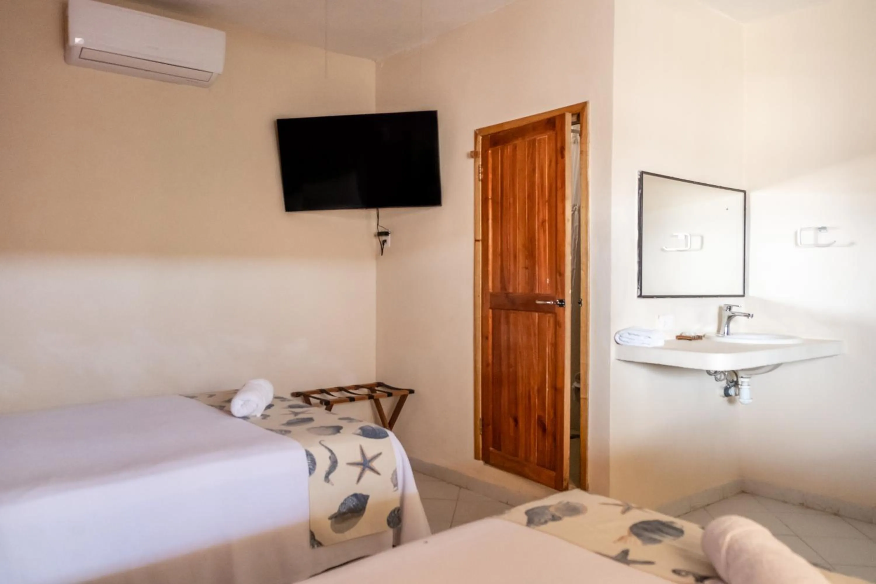 Bed in Hotel Pelicano