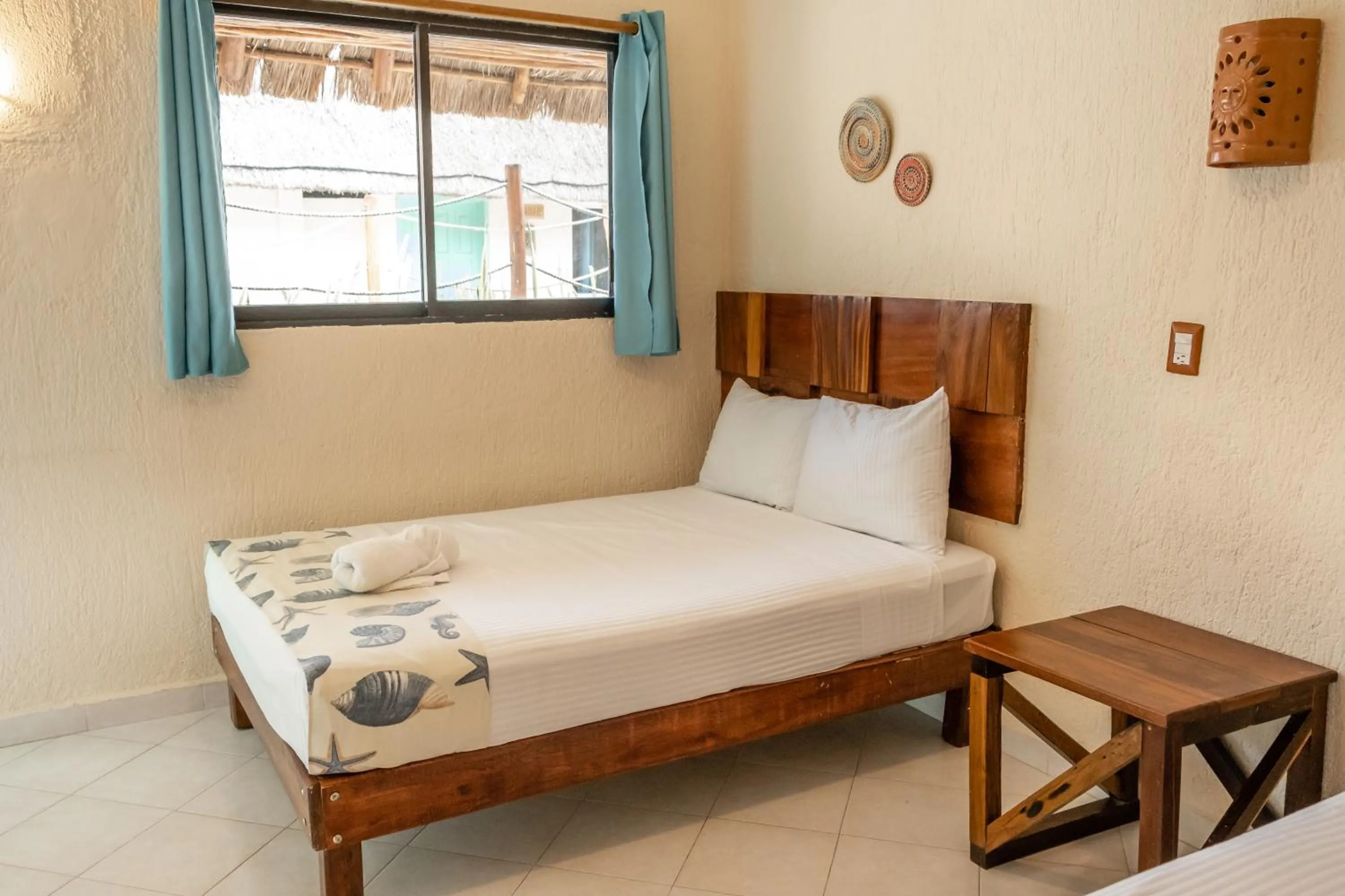 Bed in Hotel Pelicano