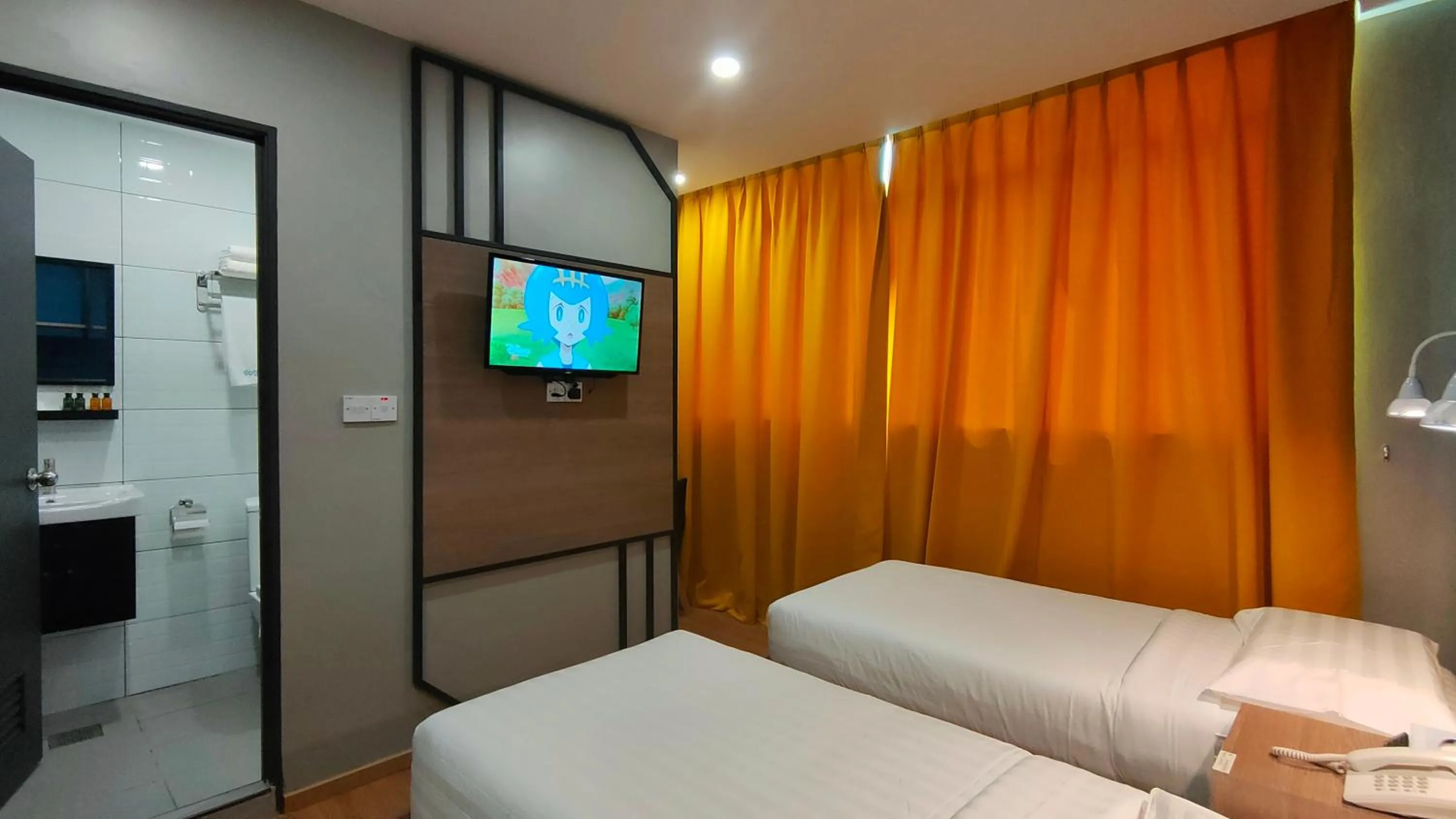 Photo of the whole room, Bed in Uptown Hotel