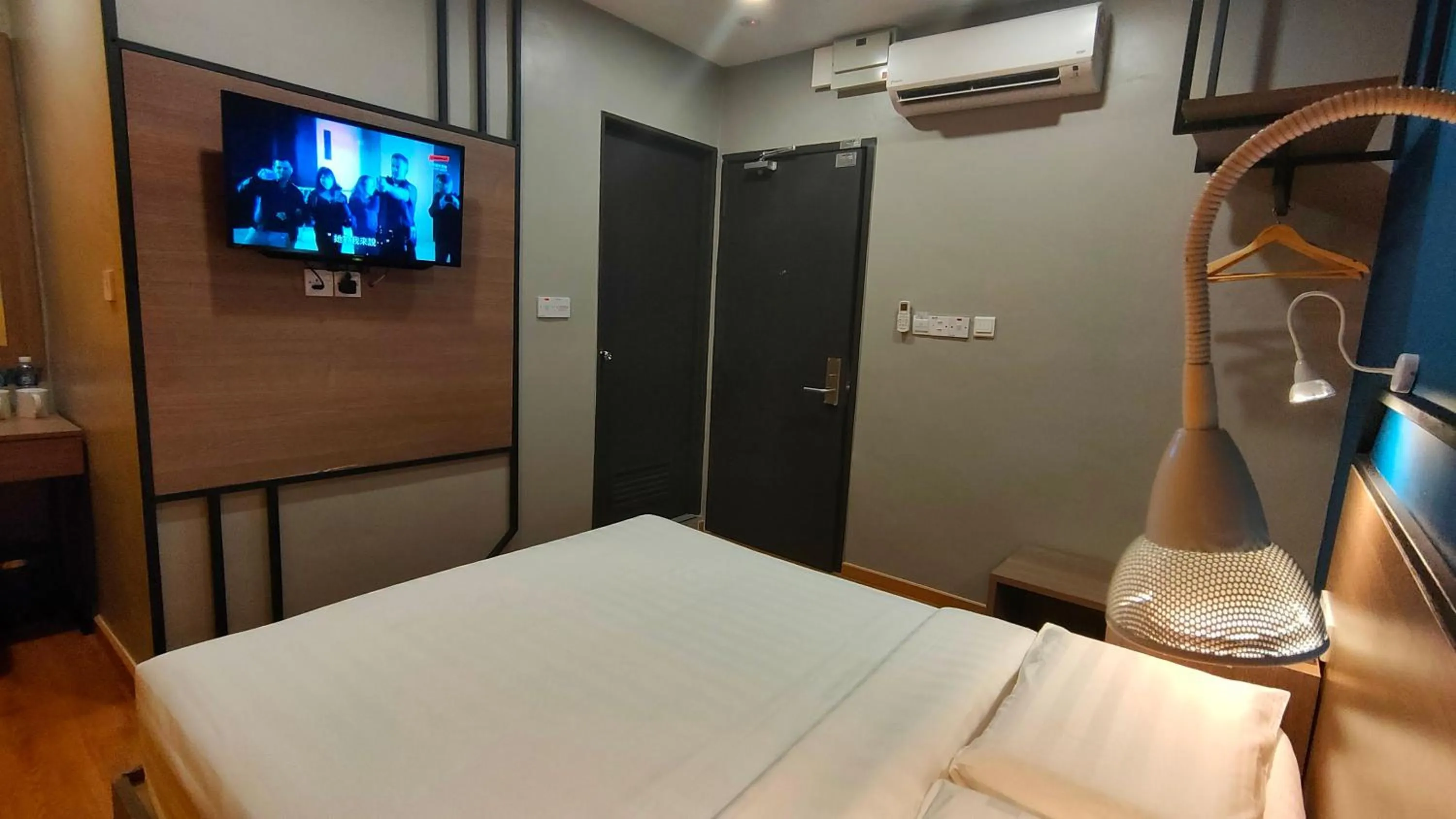 Photo of the whole room, Bed in Uptown Hotel