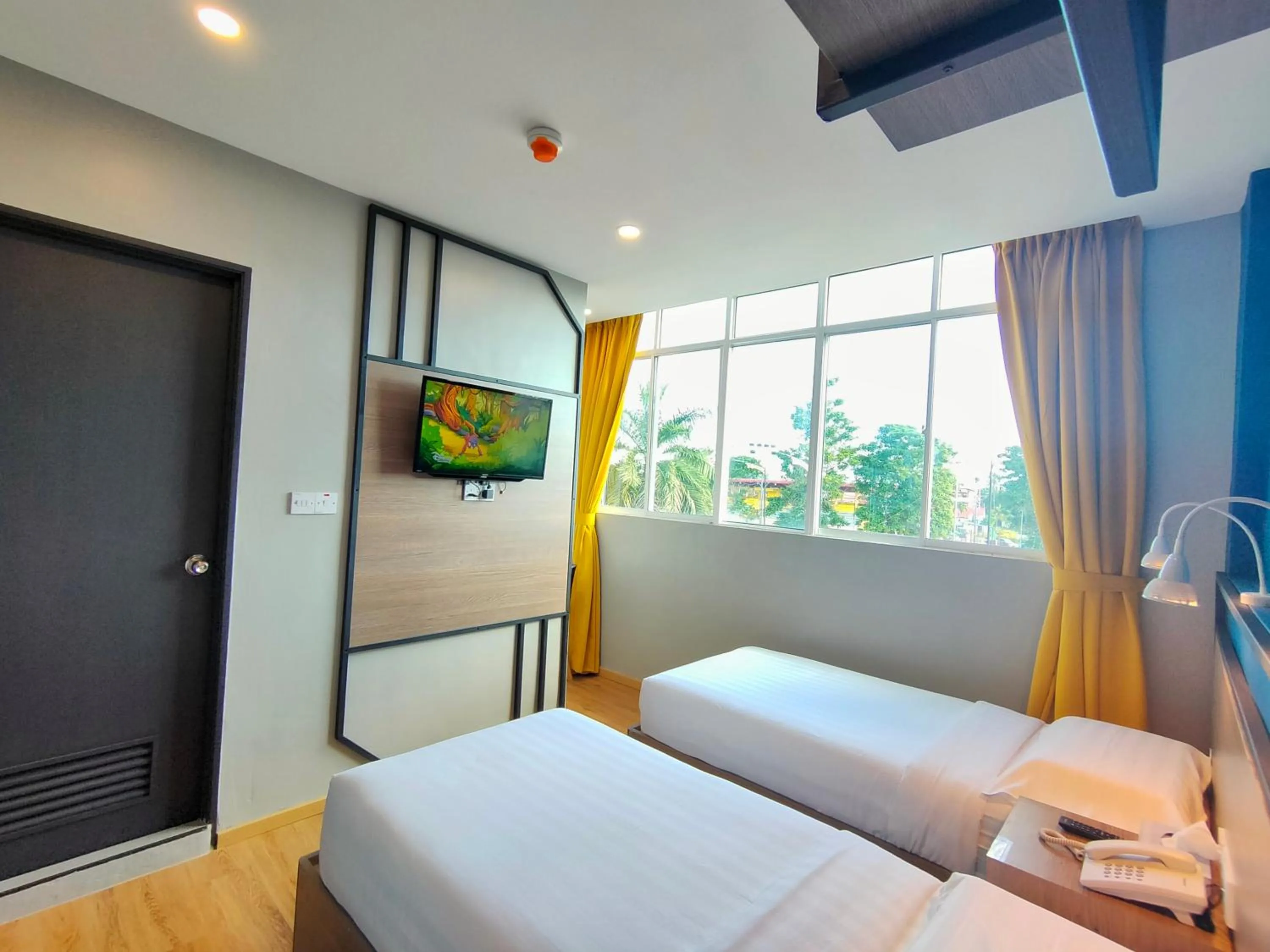 TV and multimedia, Bed in Uptown Hotel