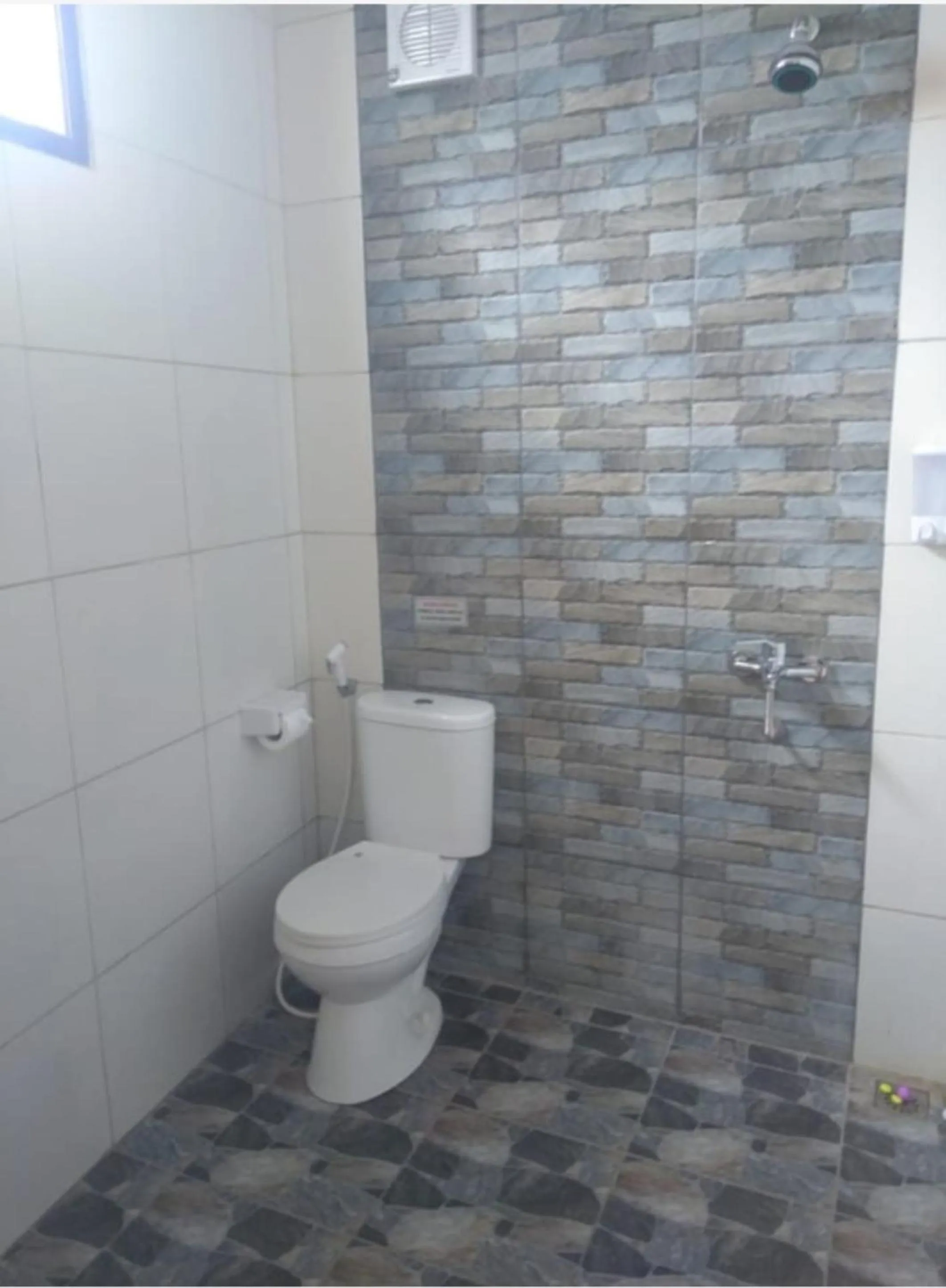 Bathroom in Maulana Hills Syariah Hotel