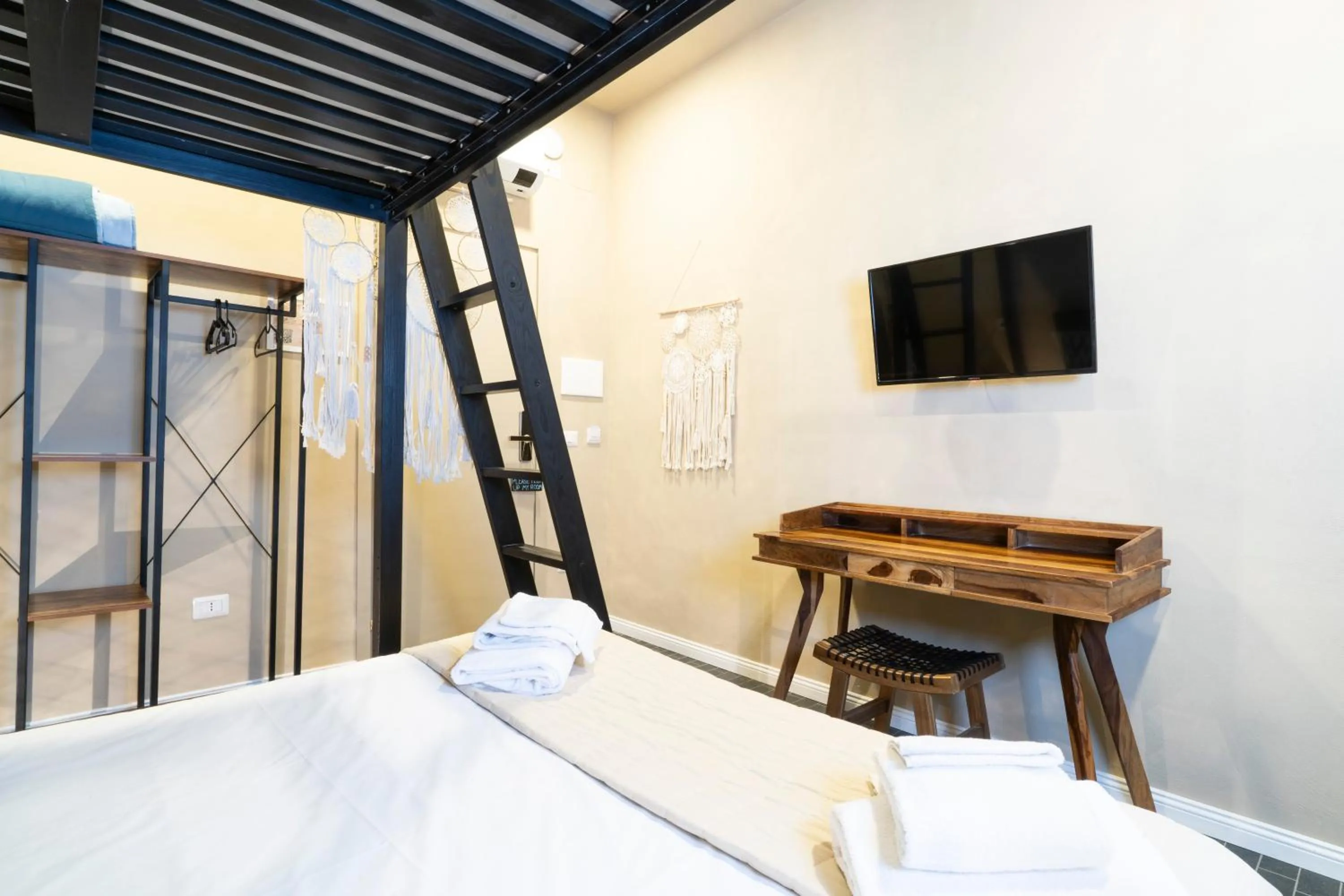 Bed in HOPESTEL Secret Garden Napoli