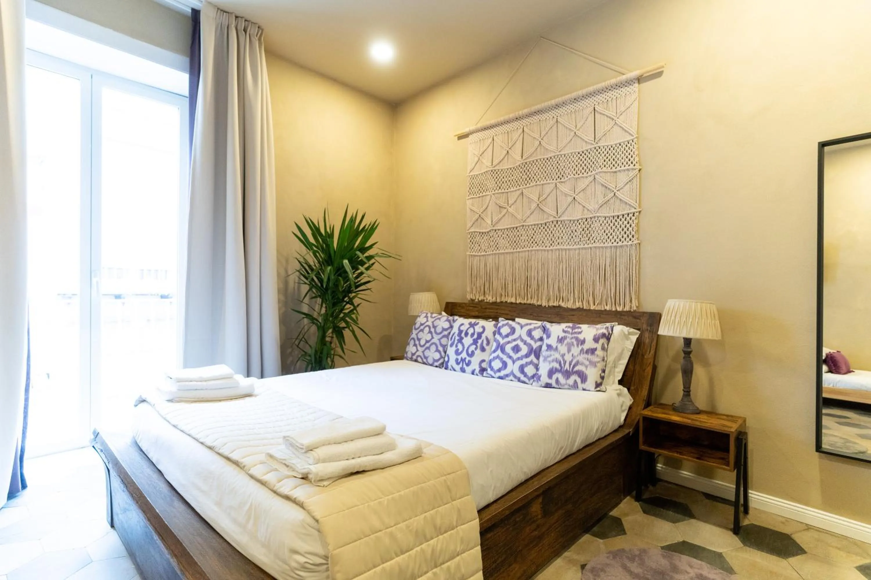 Bed in HOPESTEL Secret Garden Napoli