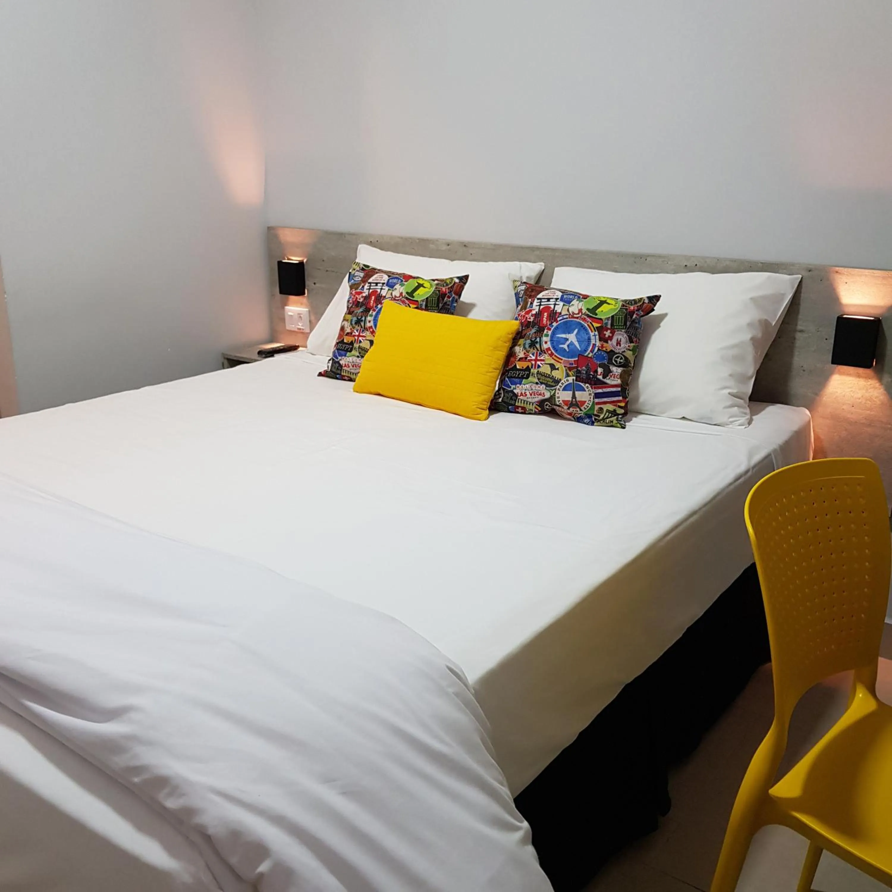 Bed in Aero Inn Hotel