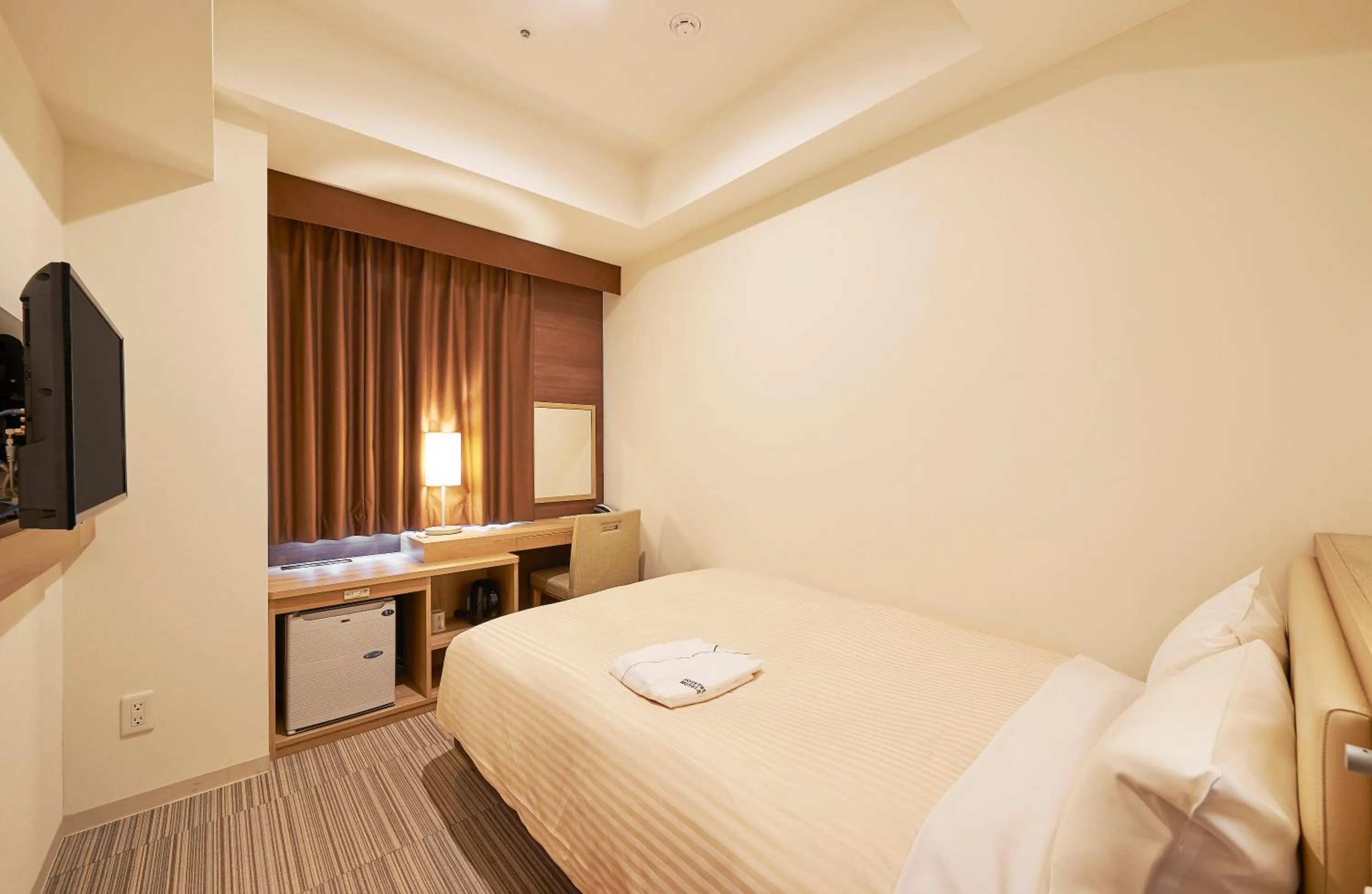 Photo of the whole room, Bed in Sotetsu Fresa Inn Kanda-Otemachi