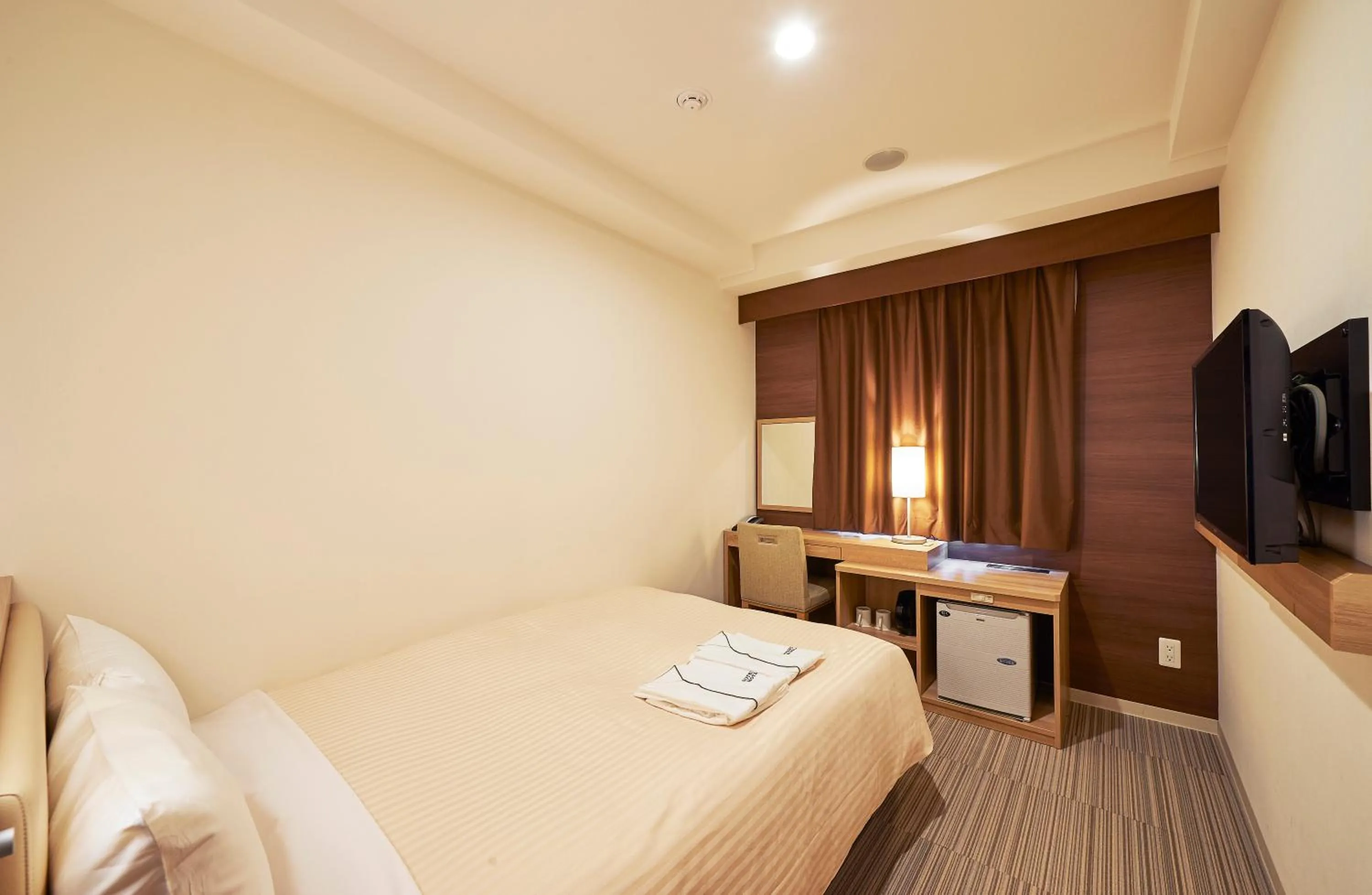 Photo of the whole room, Bed in Sotetsu Fresa Inn Kanda-Otemachi