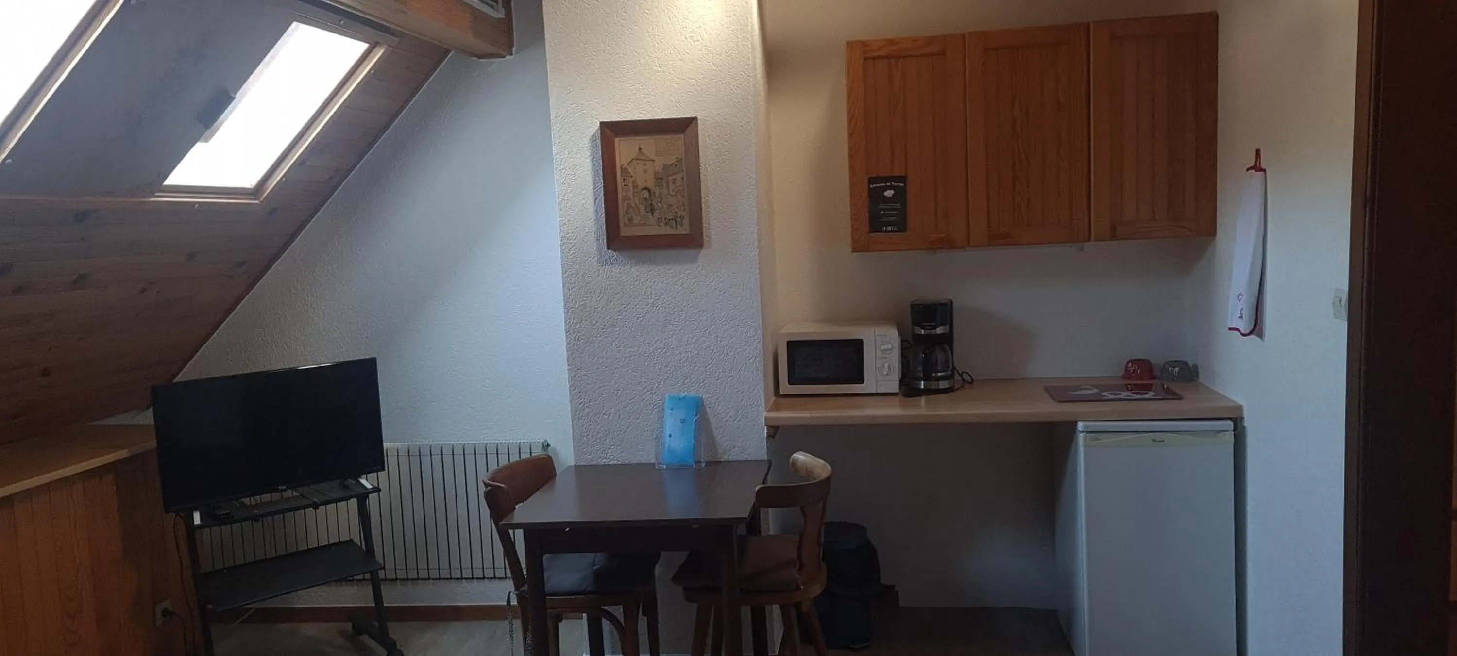 TV and multimedia in Gîte et chambres d'hôtes Les Framboises