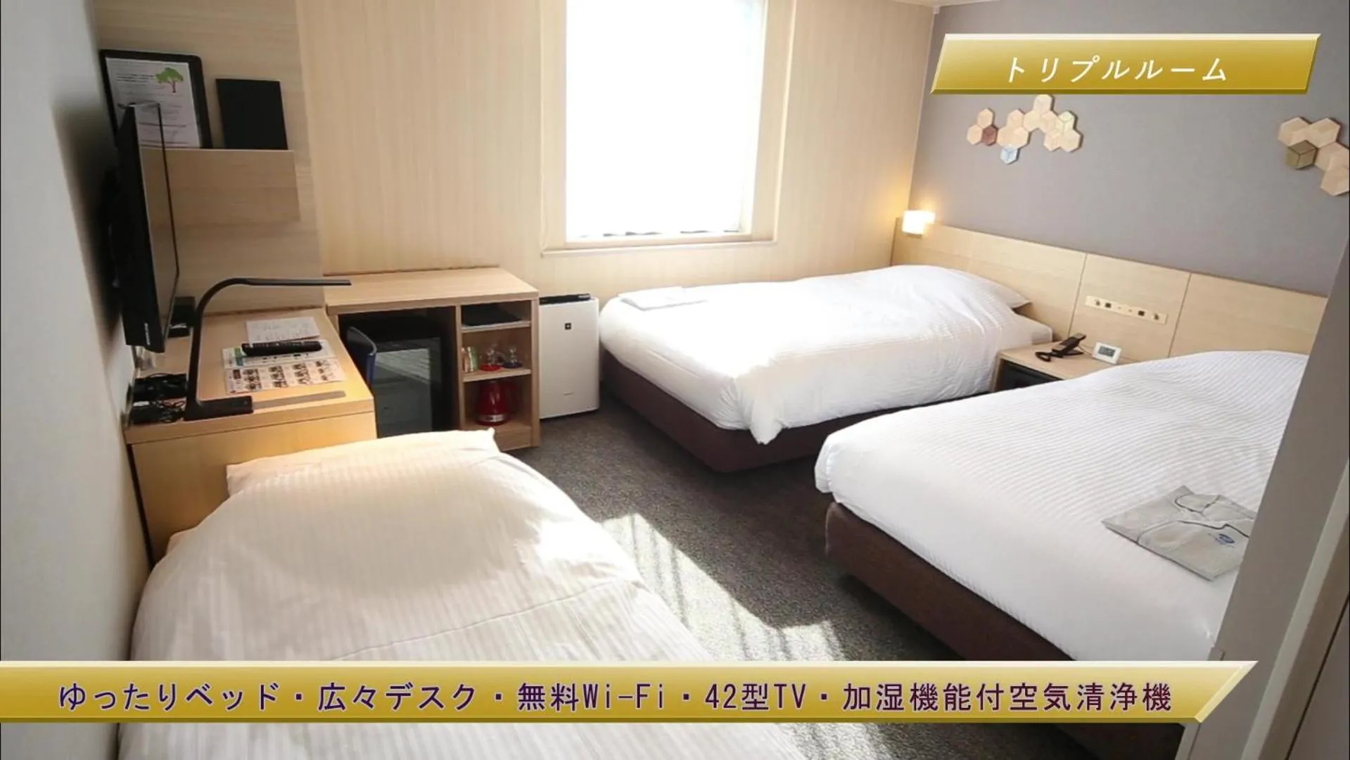 Bed in JR Clement Inn Kochi