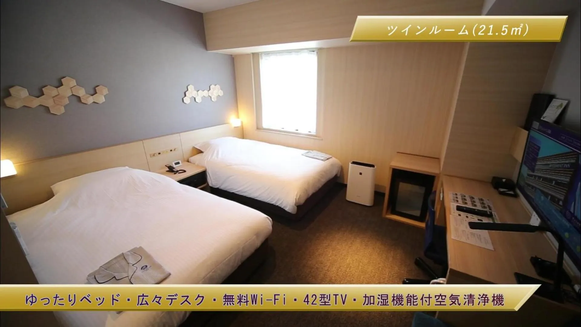 Bed in JR Clement Inn Kochi